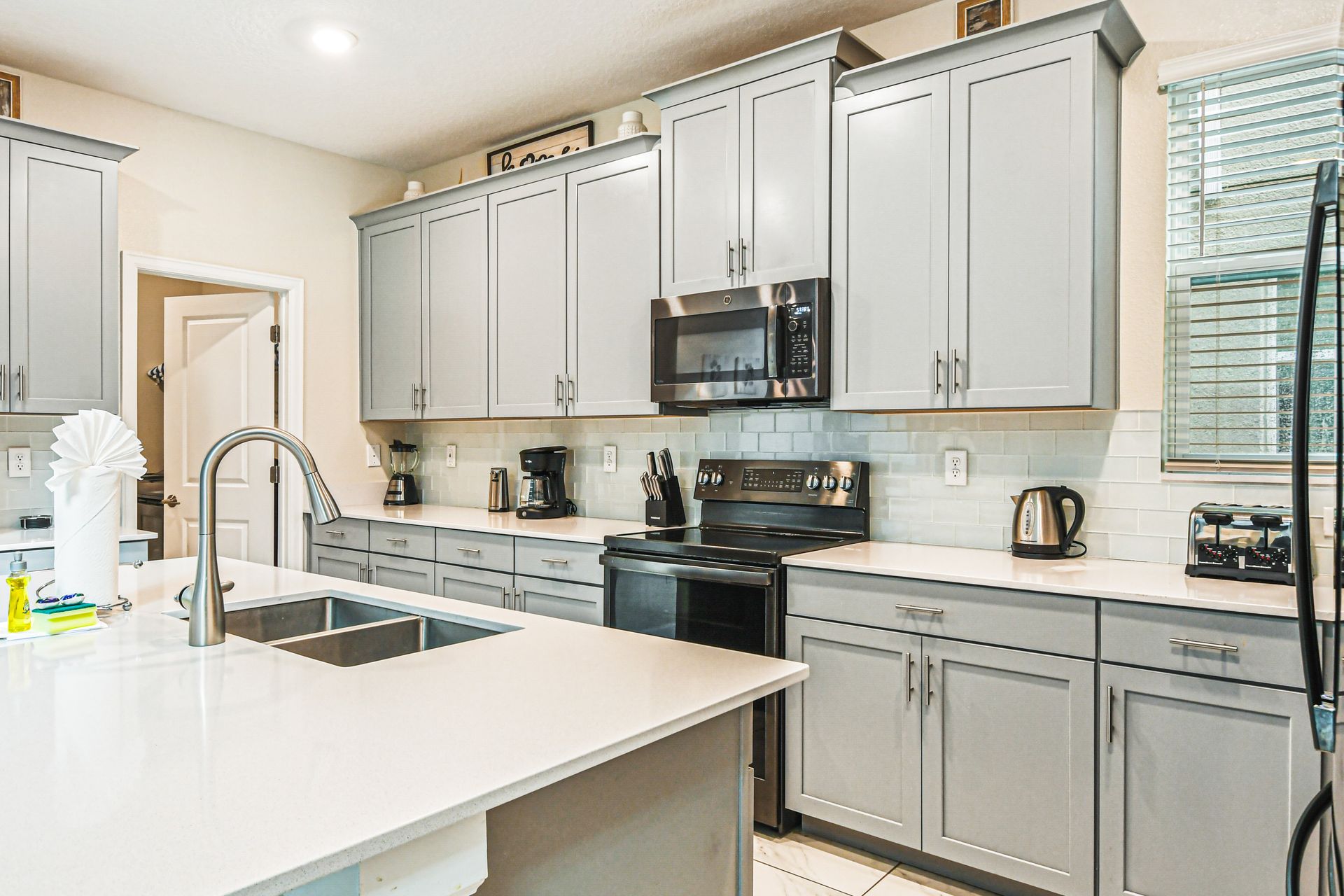 Unleash your inner chef in our modern kitchen, complete with top-of-the-line appliances for your convenience.