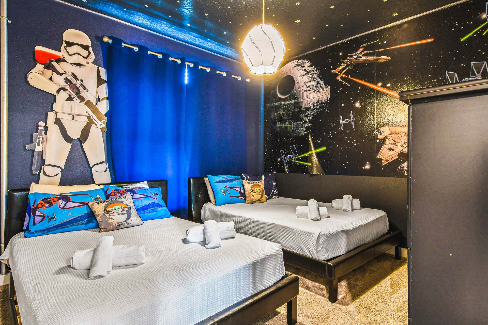 Experience a comfortable stay in our Star Wars Inspired room with two beds, offering you the perfect space to relax and recharge after a day of adventure.