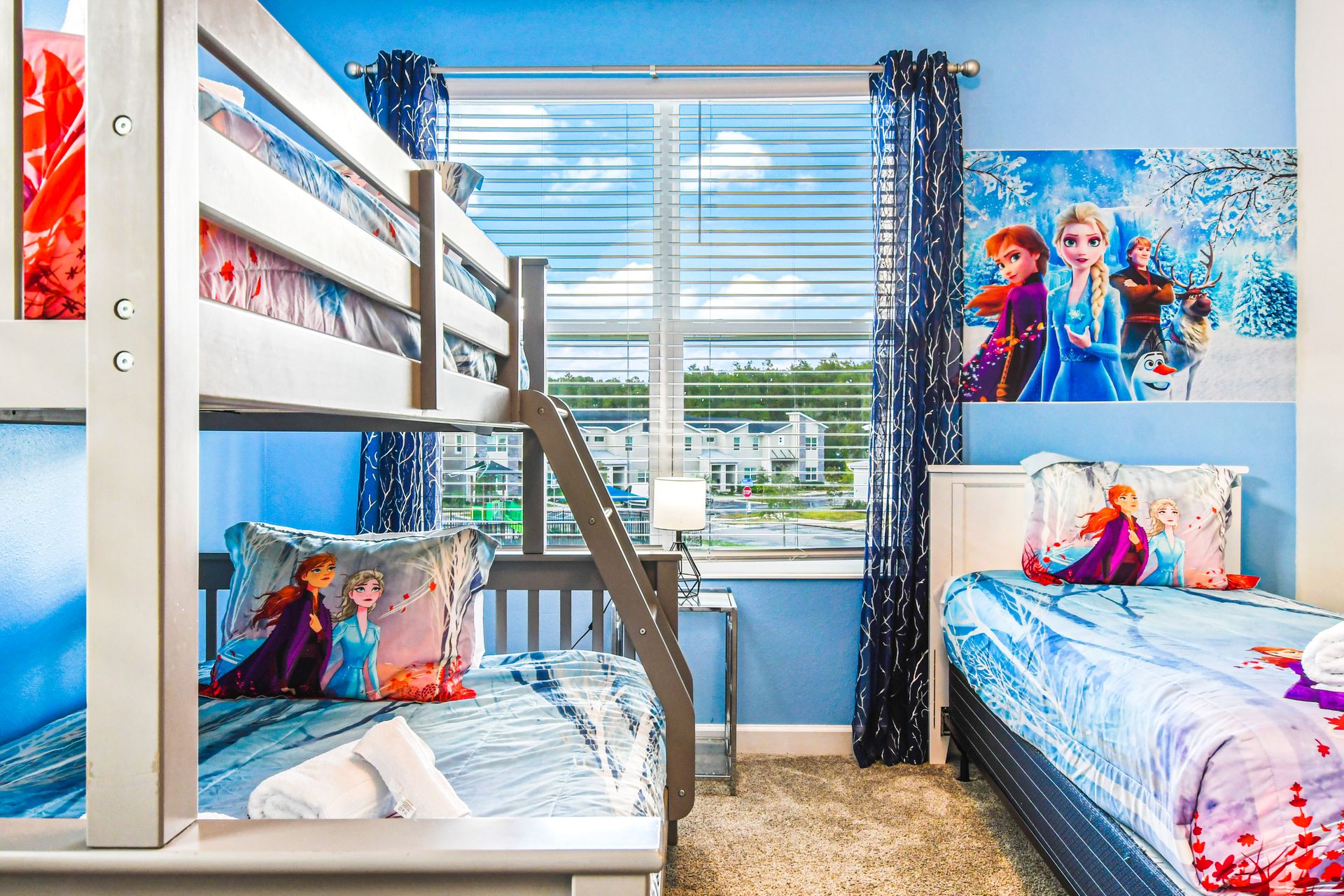 Experience a comfortable stay in our Elsa inspired room with three beds, offering you the perfect space to relax and recharge after a day of adventure.