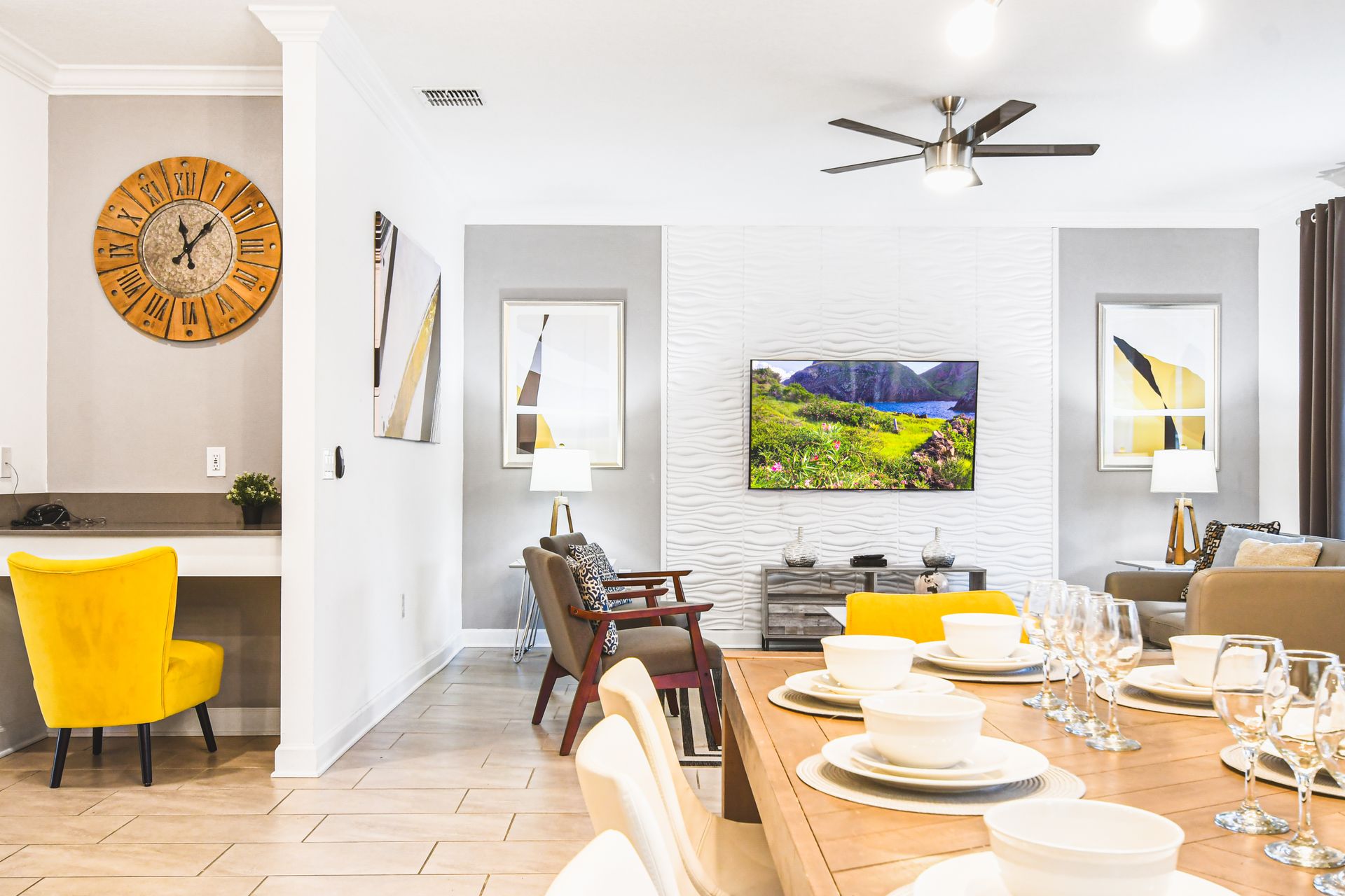 Elegant open layout with dining for eight, cozy lounge, and a vibrant workspace