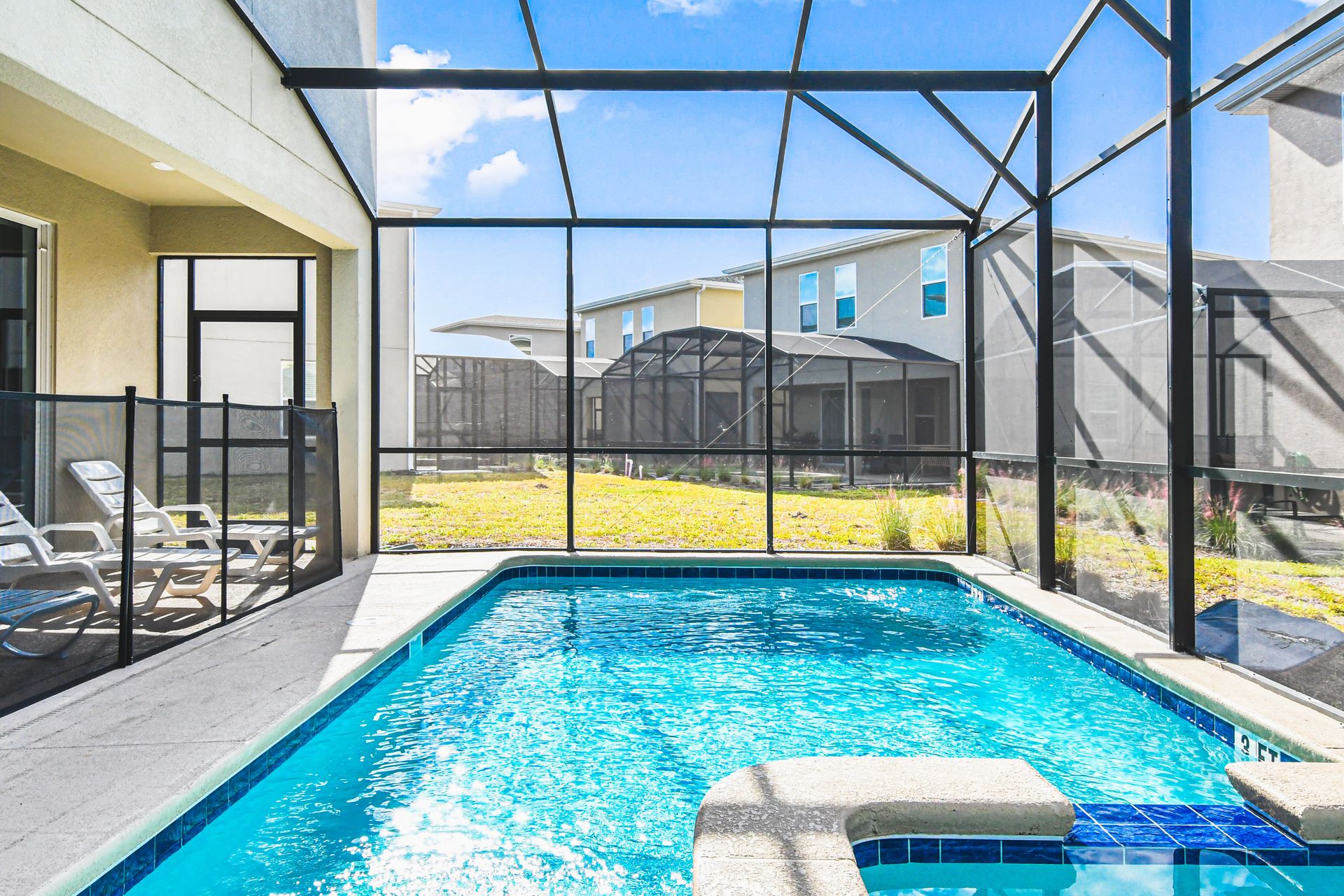 Private screened pool and spa with sunny patio—perfect for relaxing or playtime