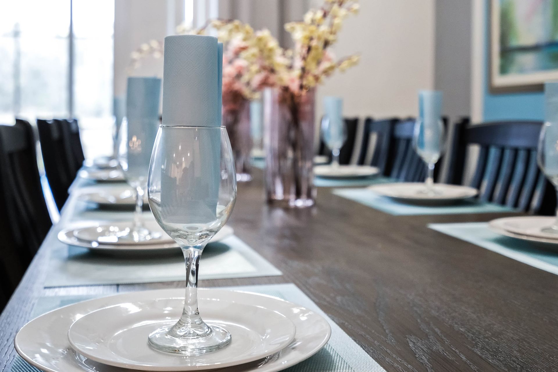 Elegantly set dining table with chic tableware, perfect for hosting memorable meals.