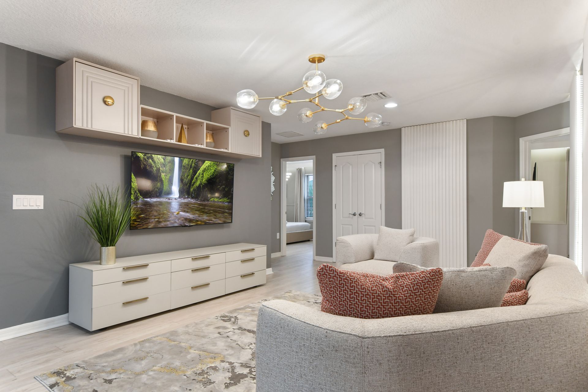 Chic and cozy lounge with modern décor, soft neutrals & a relaxing ambiance! 