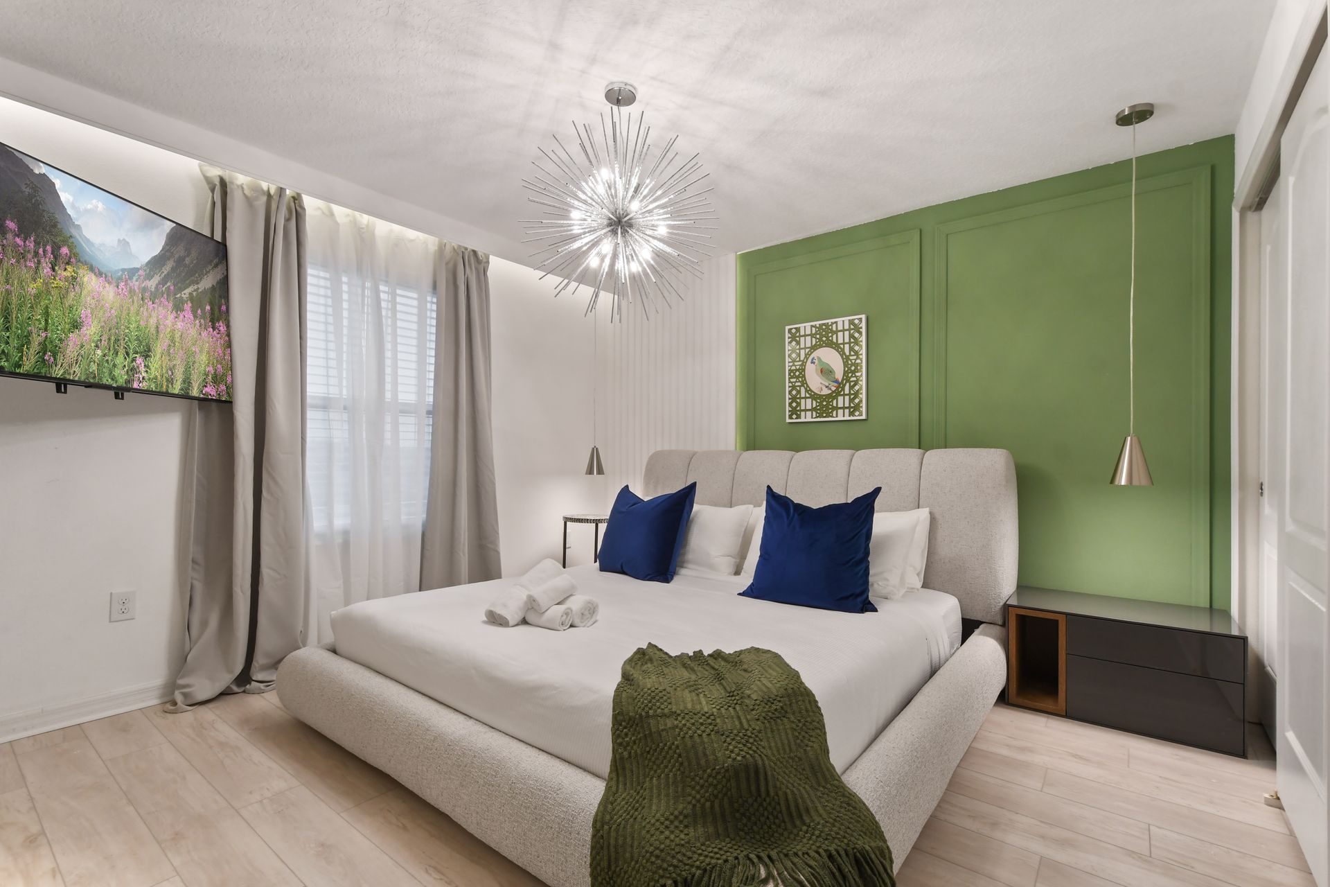 Relax in style! Elegant bedroom with luxe decor, plush bedding & cozy vibes.