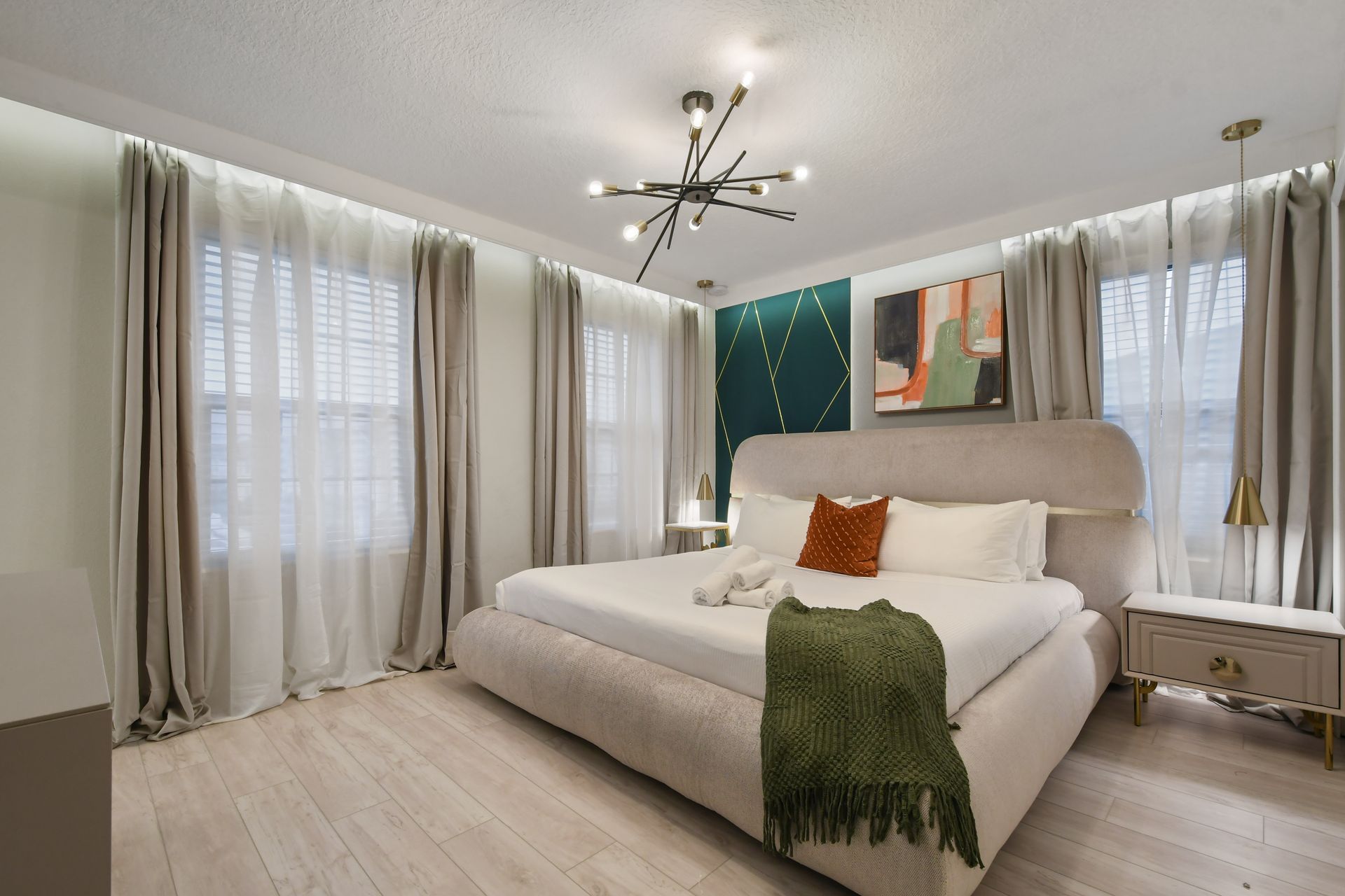 King bed, luxe décor & cozy vibes for a perfect night's rest!