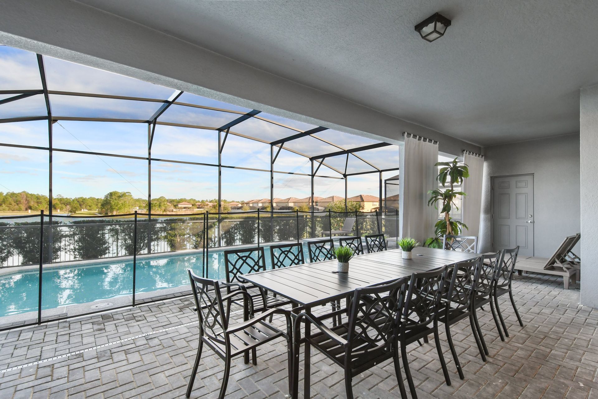 Relax in this covered patio with dining, lounge seating & a refreshing outdoor vibe!
