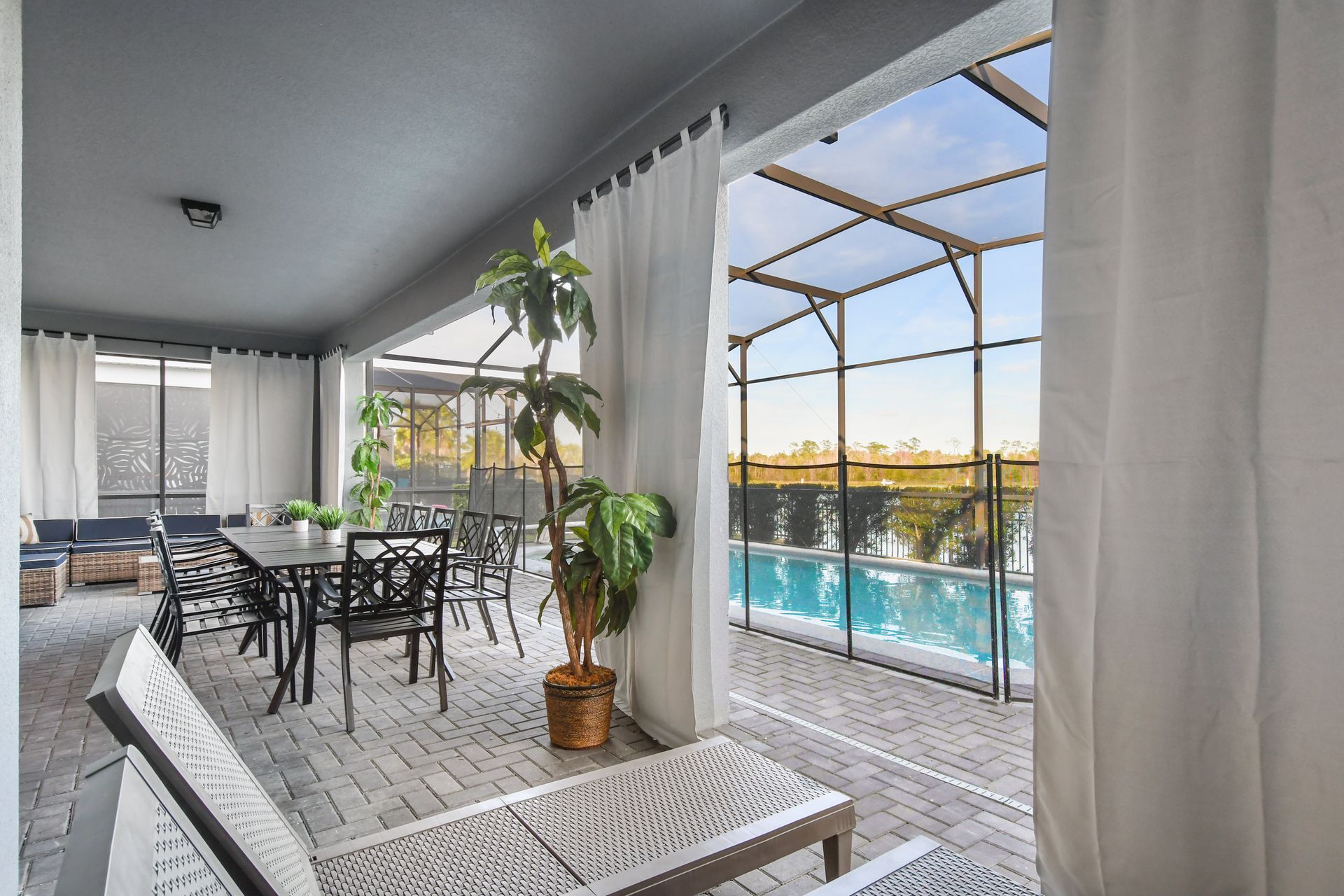 Relax in this covered patio with dining, lounge seating & a refreshing outdoor vibe!