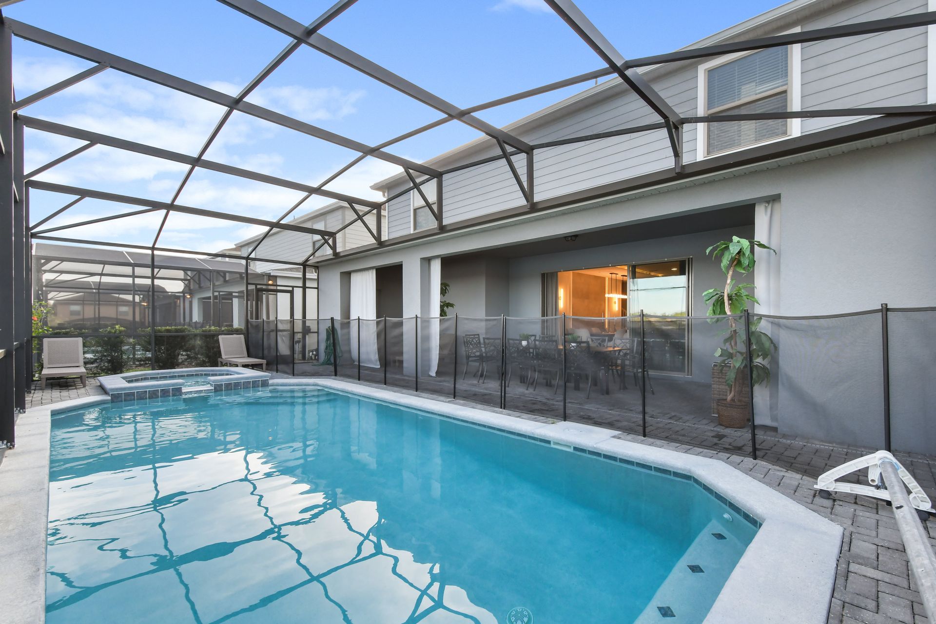 Private screened-in pool & spa with lush surroundings—your perfect getaway oasis!