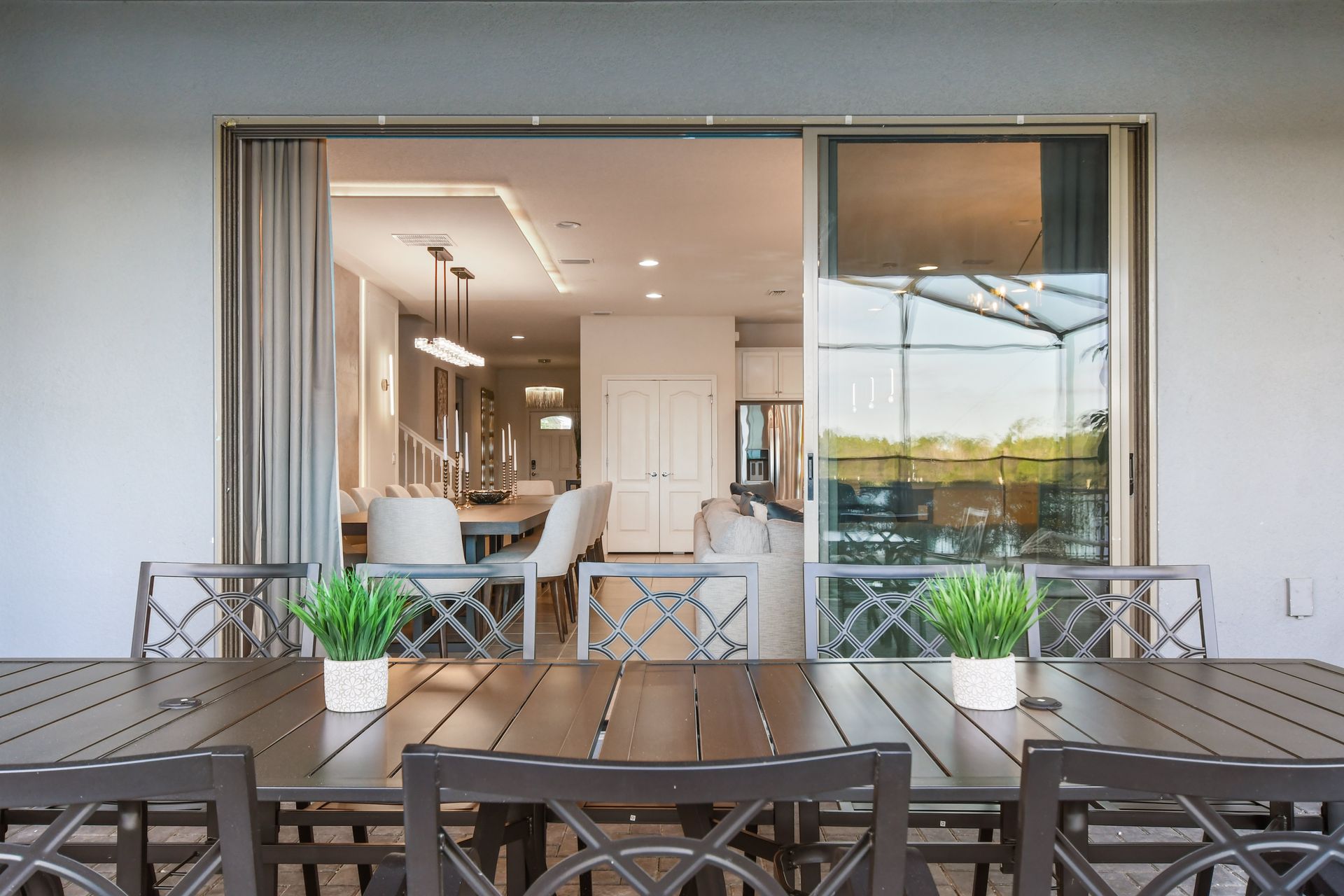 Relax in this covered patio with dining, lounge seating & a refreshing outdoor vibe!