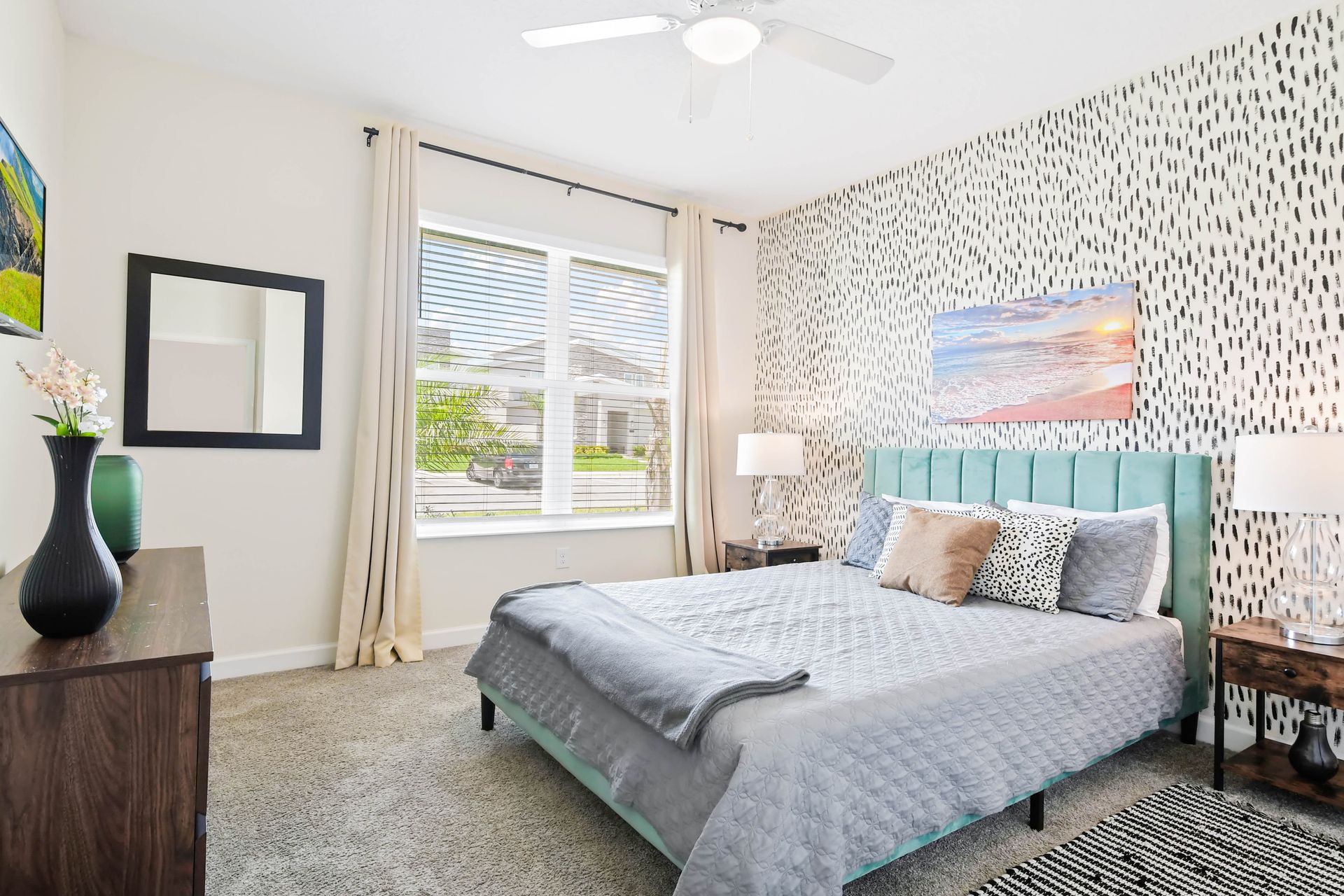 Unwind in our serene bedroom, offering you a tranquil oasis to relax and recharge.