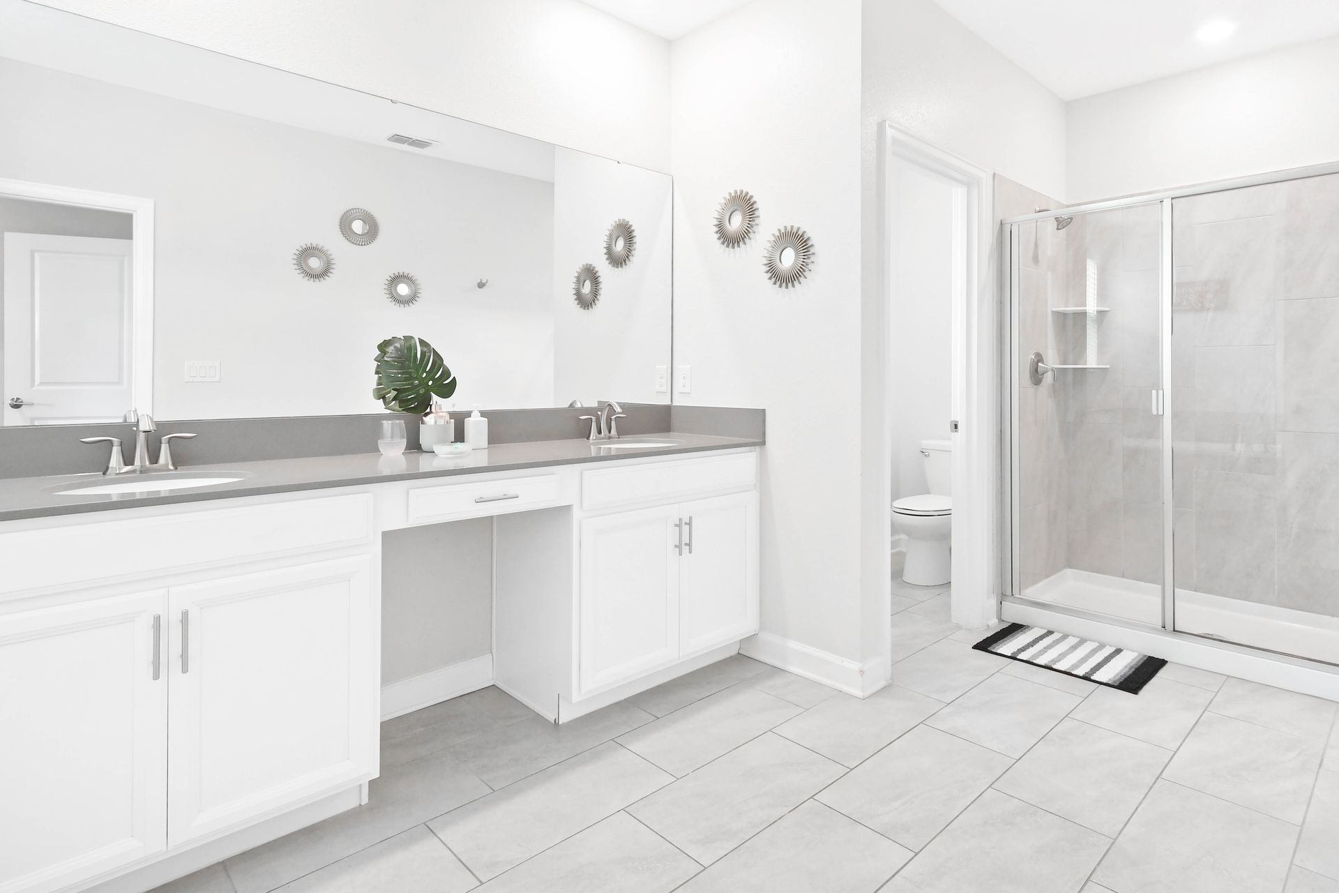 Indulge in luxury in our well-appointed bathroom, providing you with all the amenities you need for a comfortable stay.