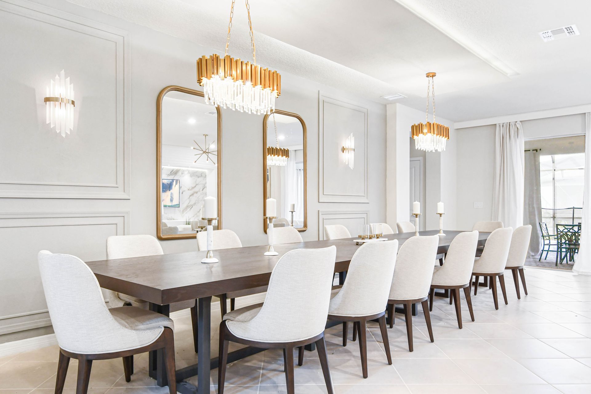 The open-plan layout offers a seamless flow into the dining area and kitchen, making it perfect for socializing and relaxing.