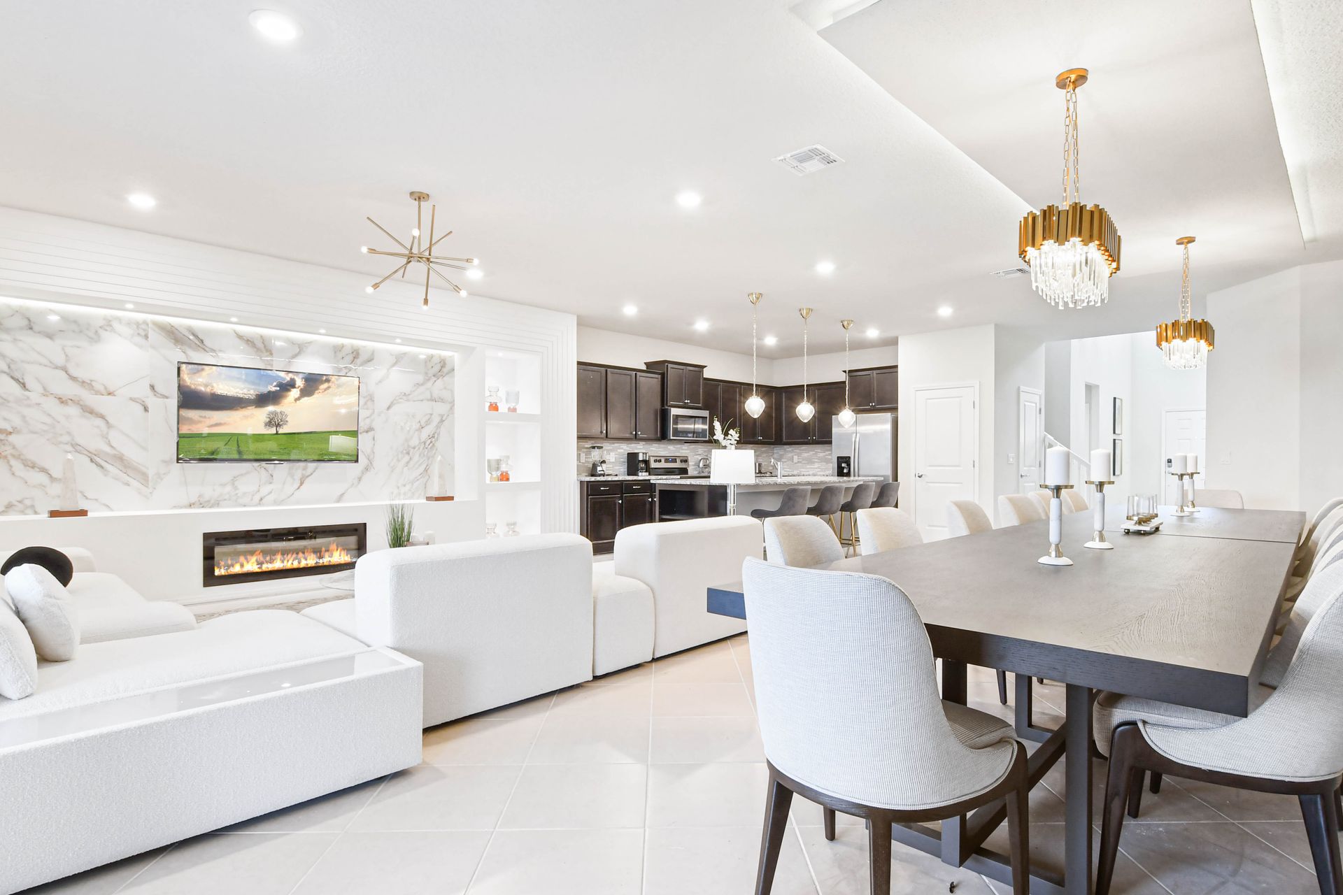 Spacious open-concept living with sleek kitchen, luxe dining, and designer touches