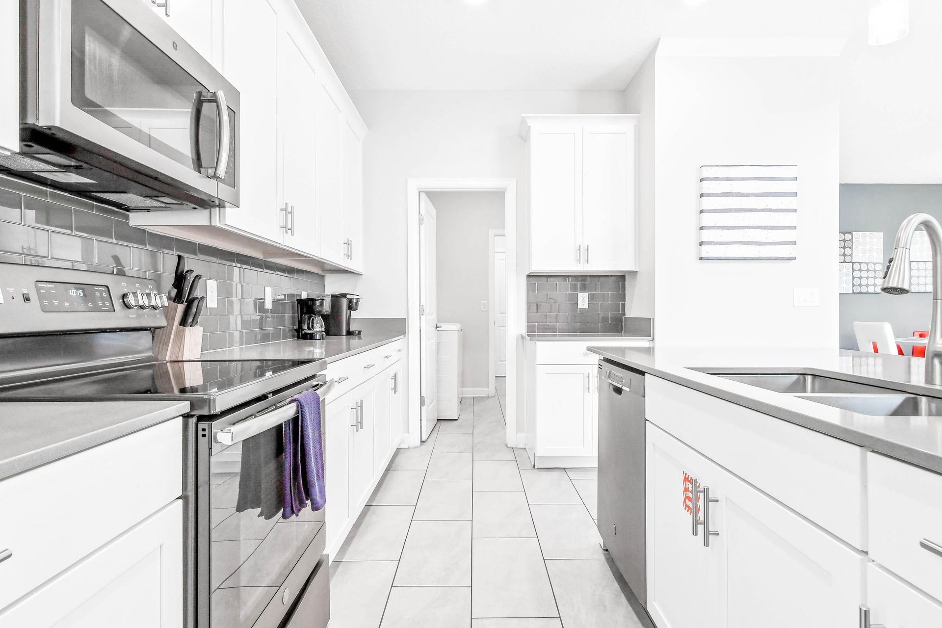 Unleash your inner chef in our modern kitchen, complete with top-of-the-line appliances for your convenience.