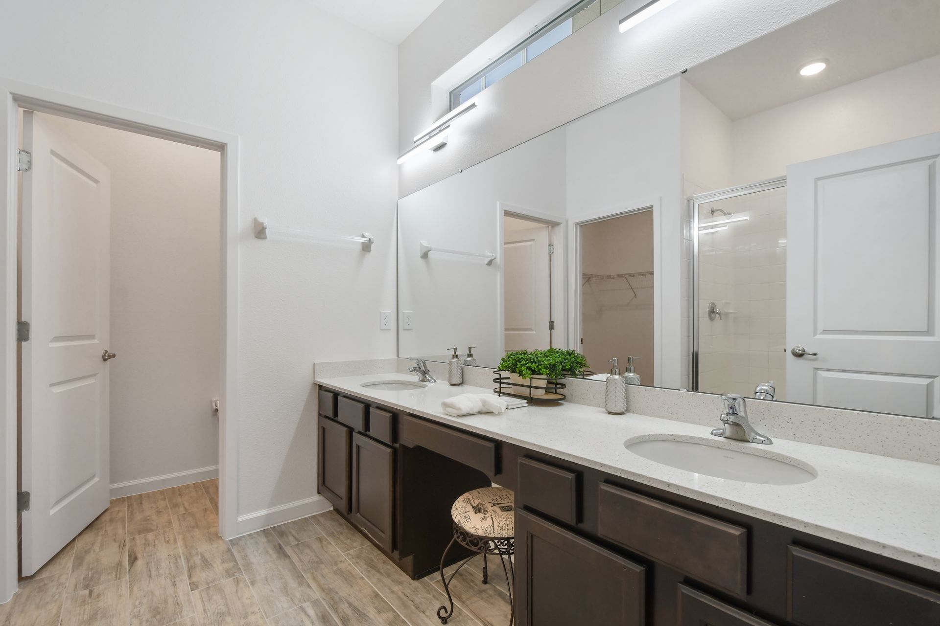 Spacious spa-like bathroom w/ double vanity, walk-in shower & modern finishes!