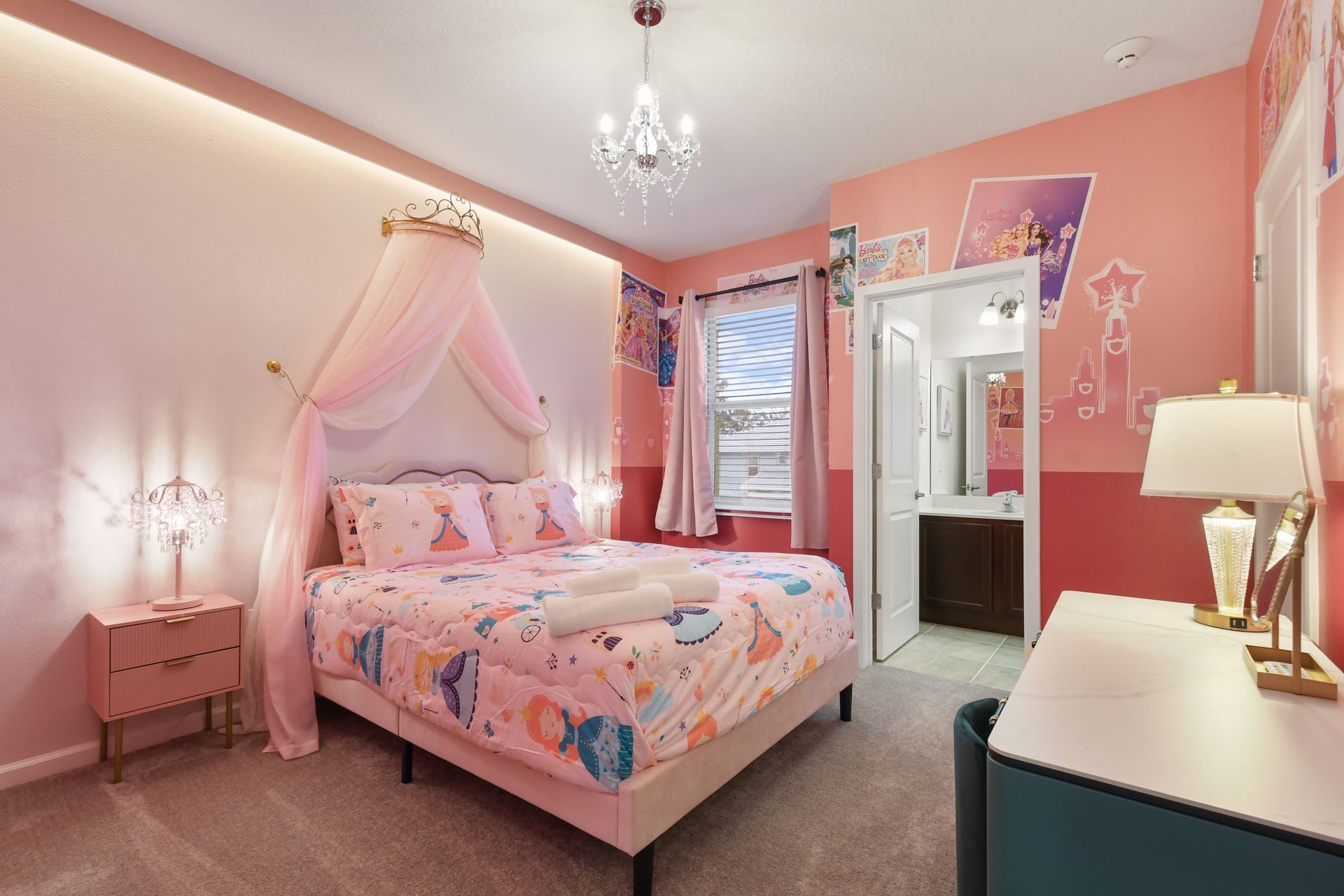 Whimsical princess-themed bedroom with a canopy bed, elegant lighting, and dreamy decor.