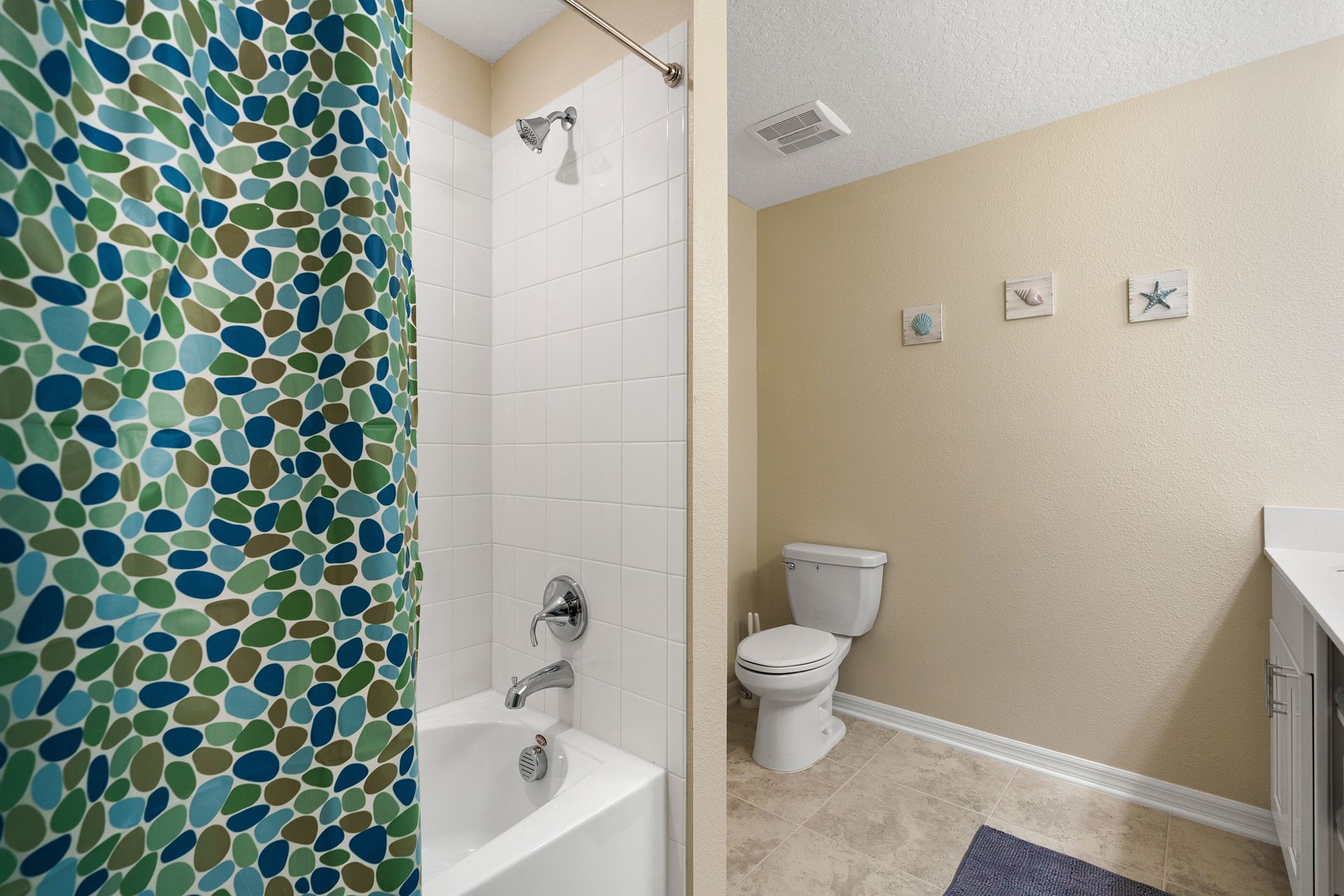 Complete bathroom equipped with all essential fixtures, offering a comprehensive space for personal hygiene and relaxation