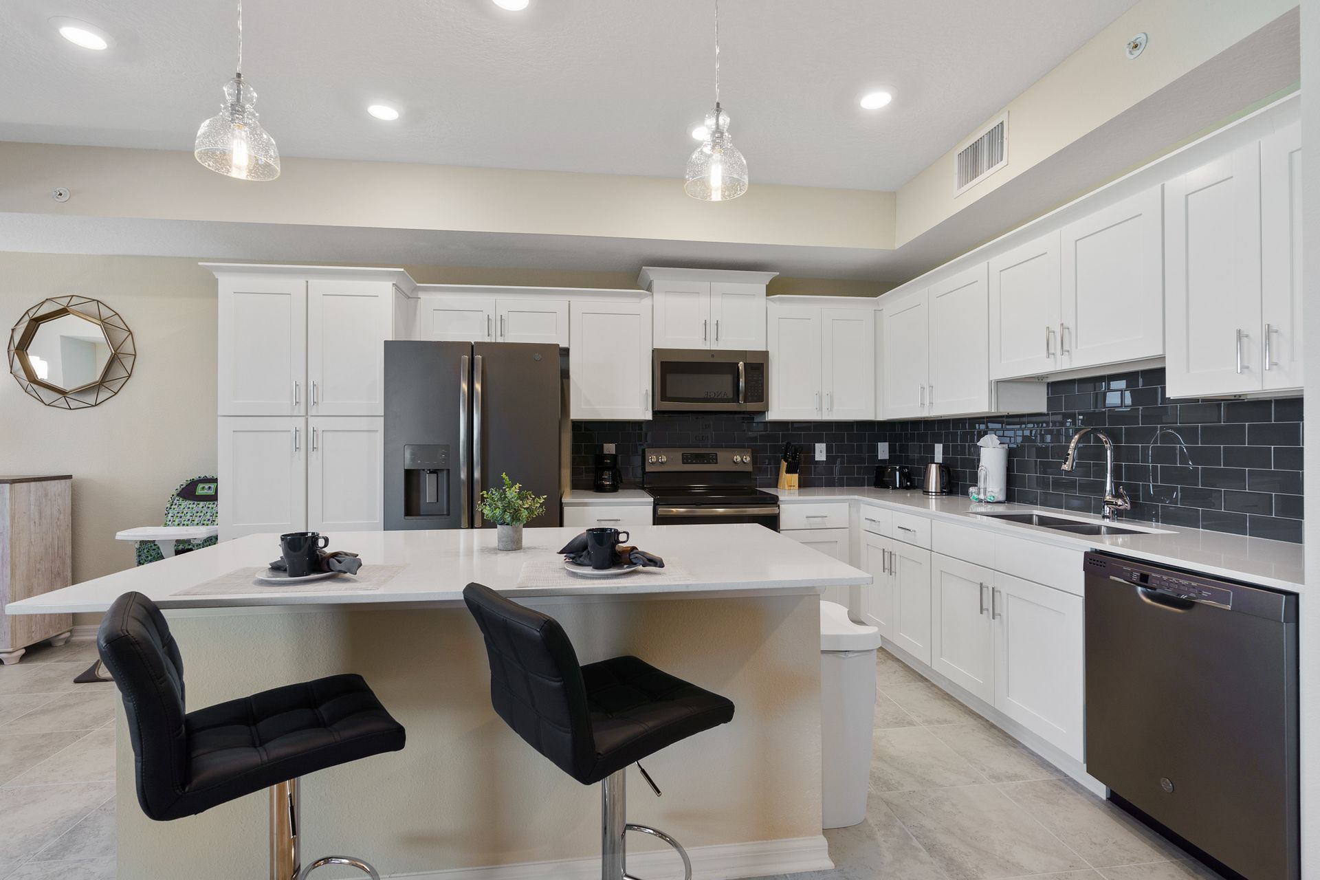 Kitchen featuring a convenient breakfast bar, offering a stylish and casual dining space for quick meals or socializing while preparing food