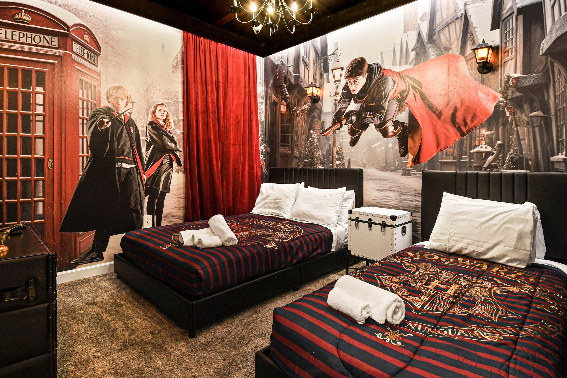 Magical wizard-themed bedroom with twin beds, castle murals, and enchanting details.