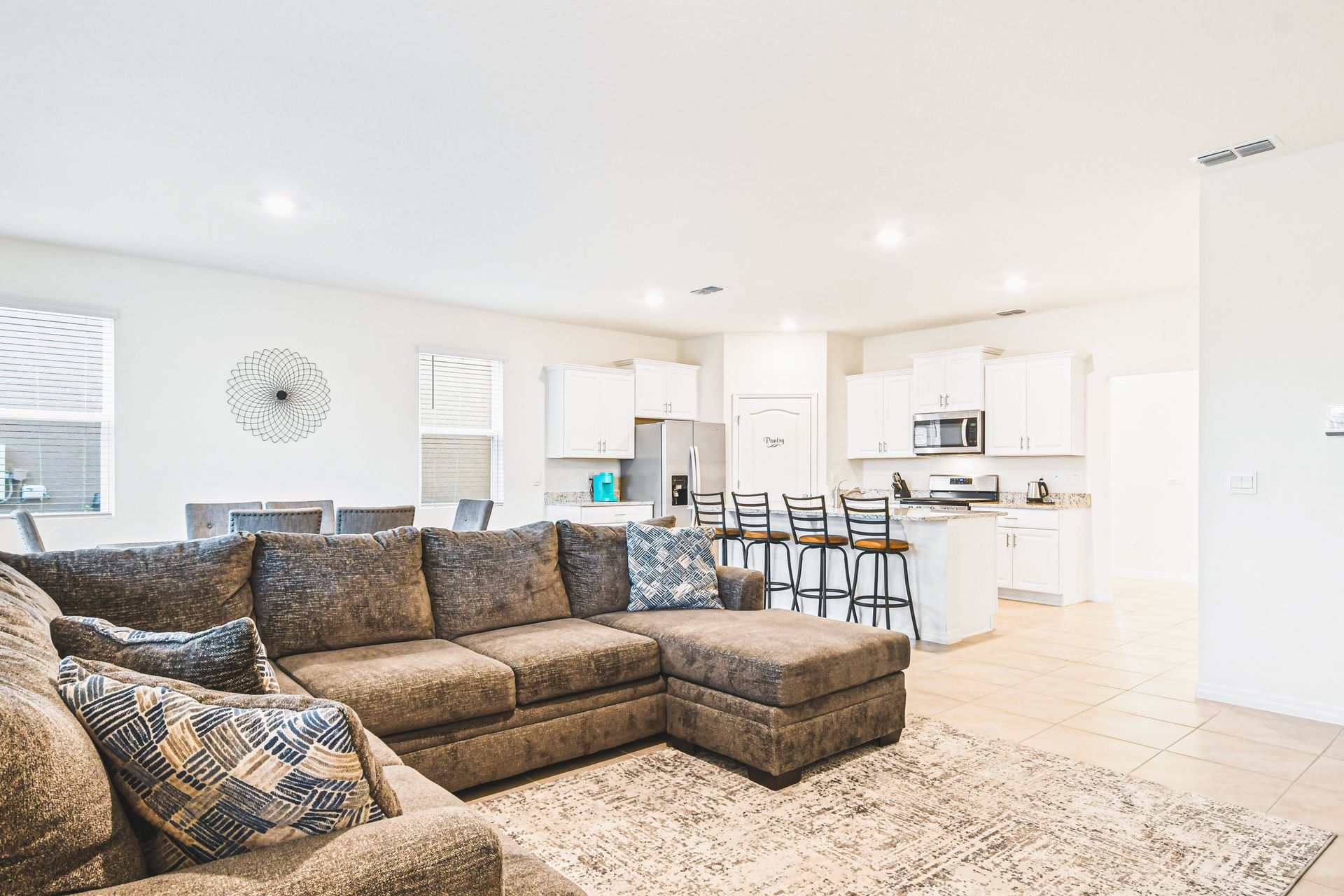 Kick back and relax in our spacious living room, where you can unwind with your favorite book or movie.