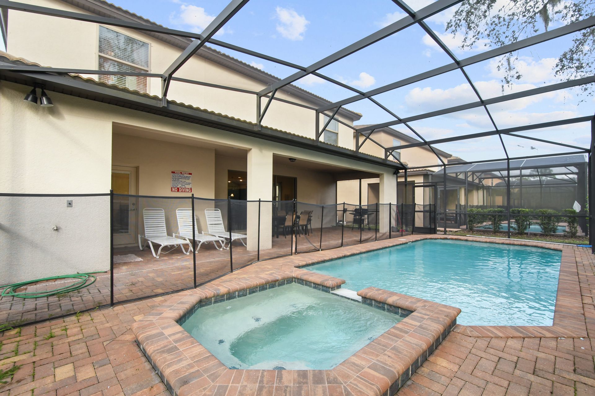 Relax in a private screened pool and spa at this spacious family-friendly retreat.