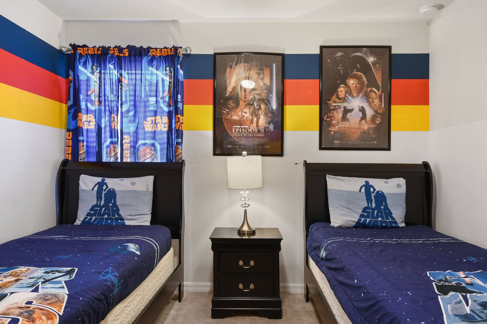 Star Wars themed twin bedroom, a fun galactic retreat for young adventurers.