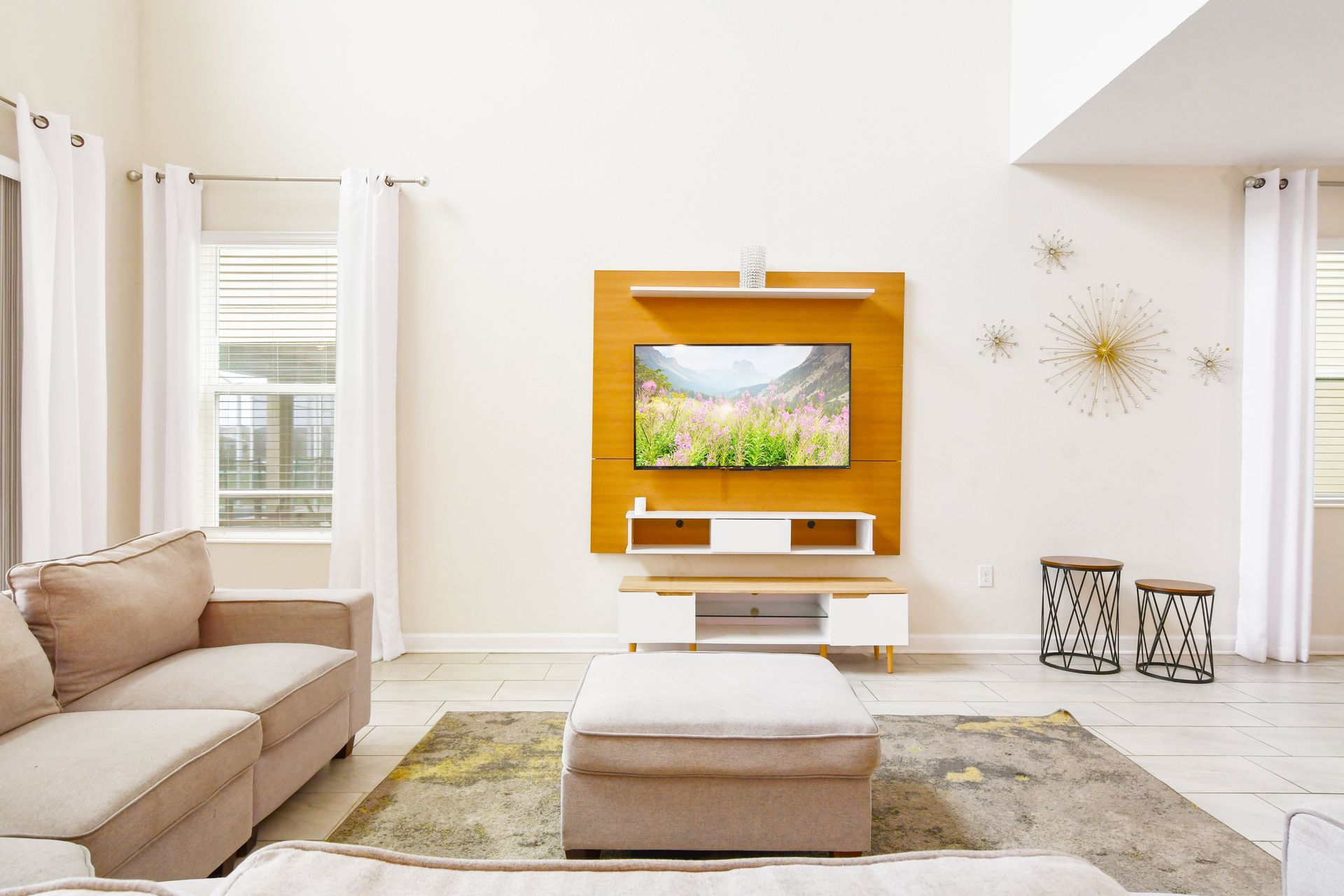 Enjoy quality time with loved ones in our inviting living room, offering a cozy space for relaxation.