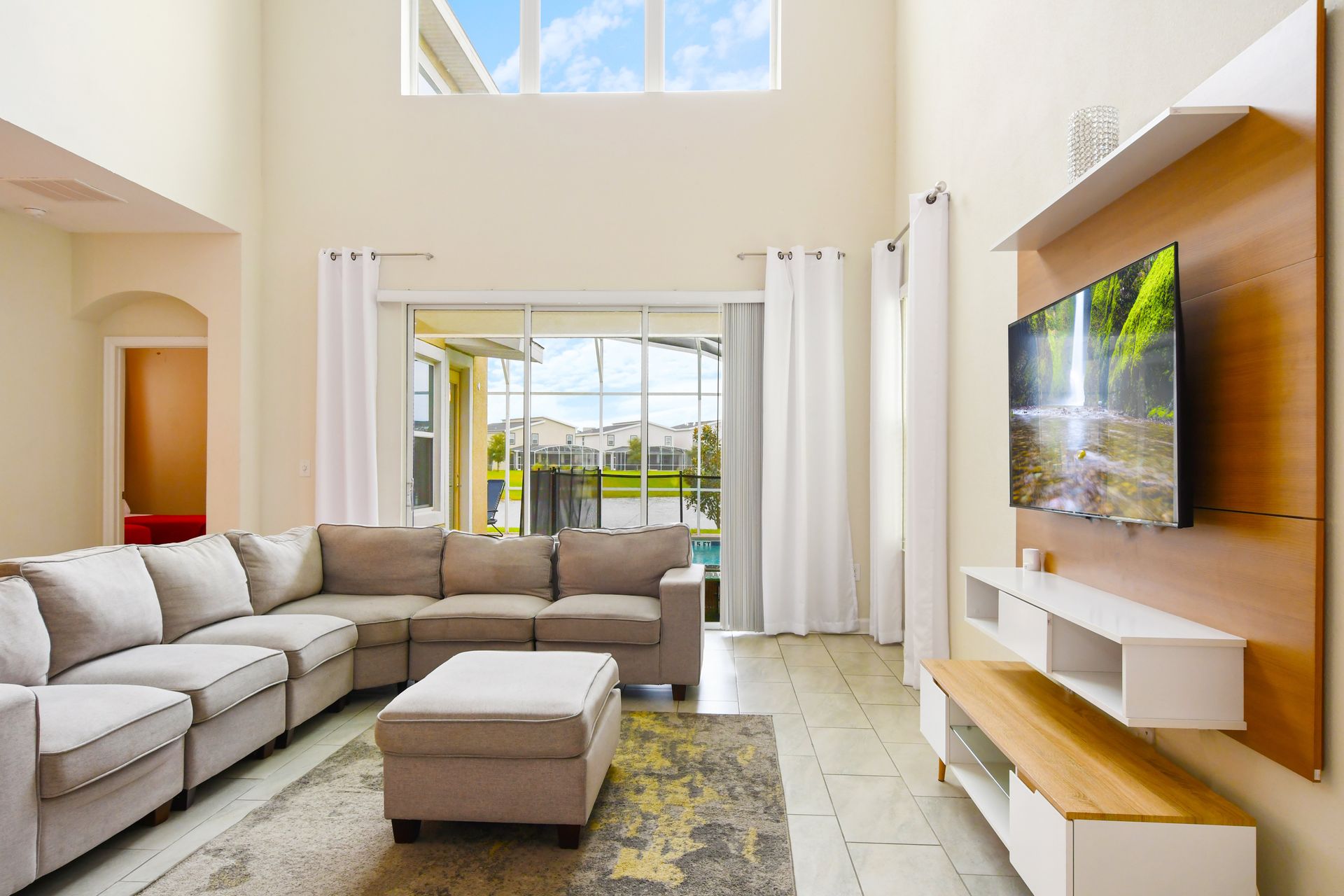 Enjoy quality time with loved ones in our inviting living room, offering a cozy space for relaxation.