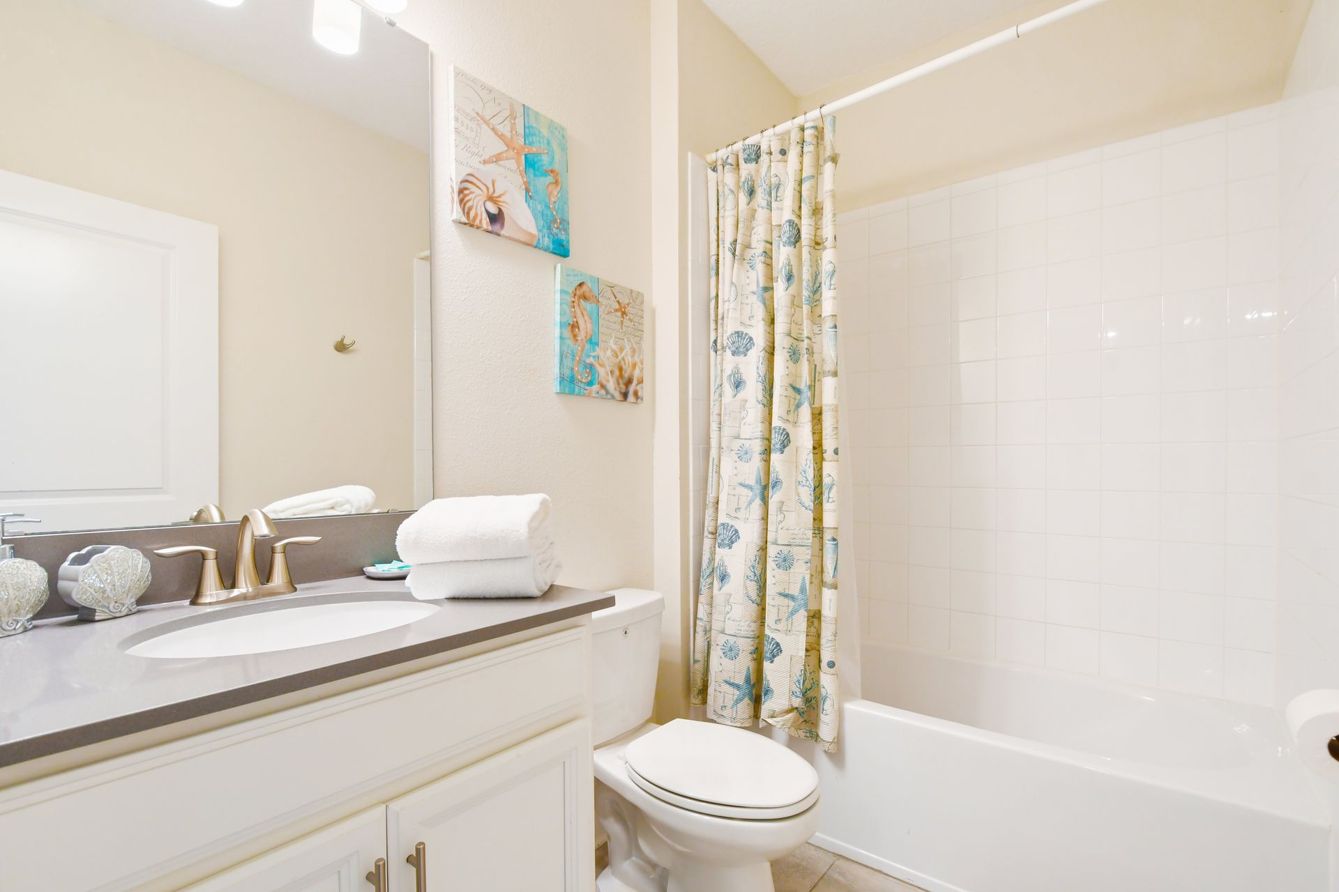 Relax and unwind in our stylish bathroom, providing you with a tranquil retreat during your time here.