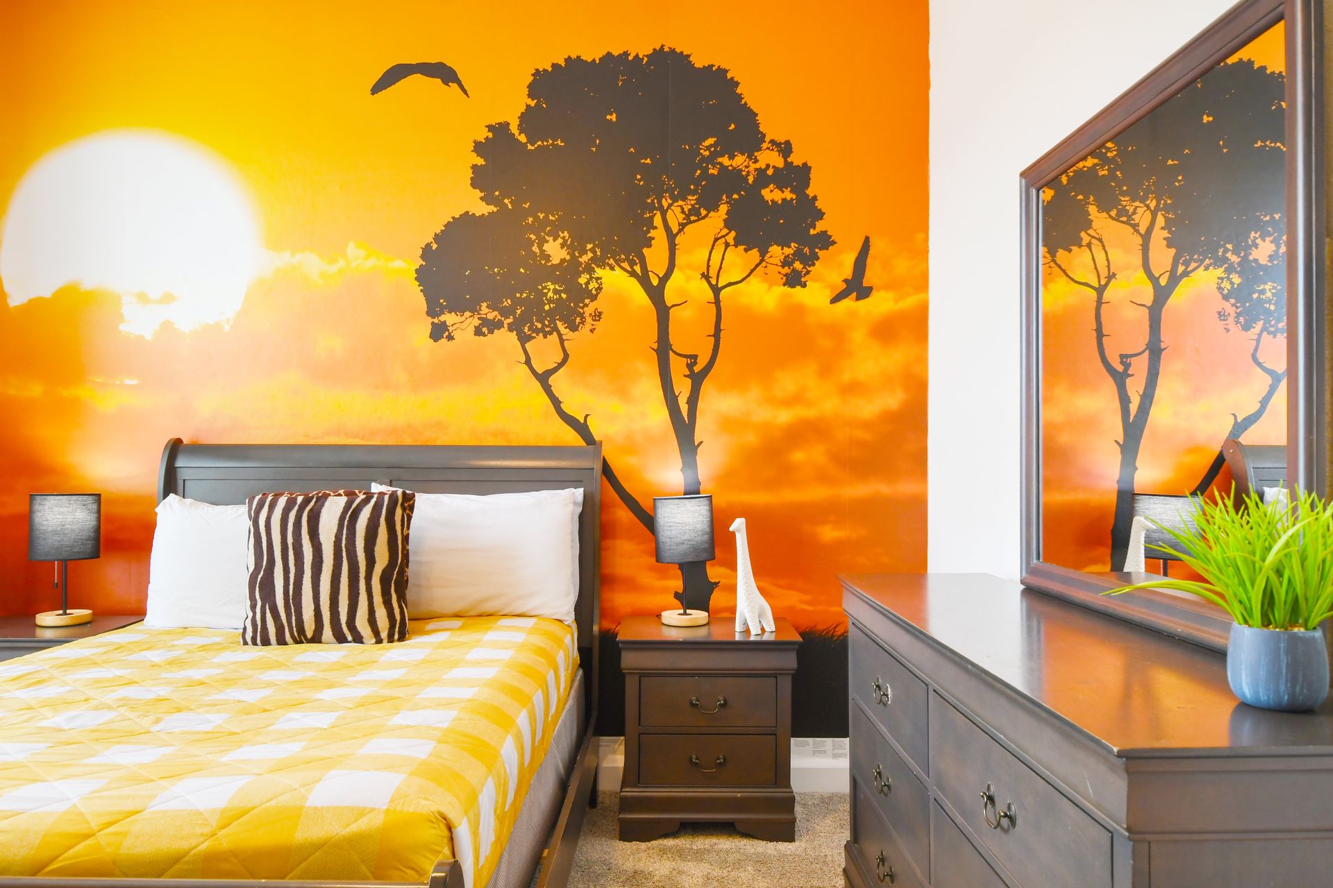 Relax in style in our cozy safari themed bedroom, providing you with a comfortable retreat after a day of adventure.