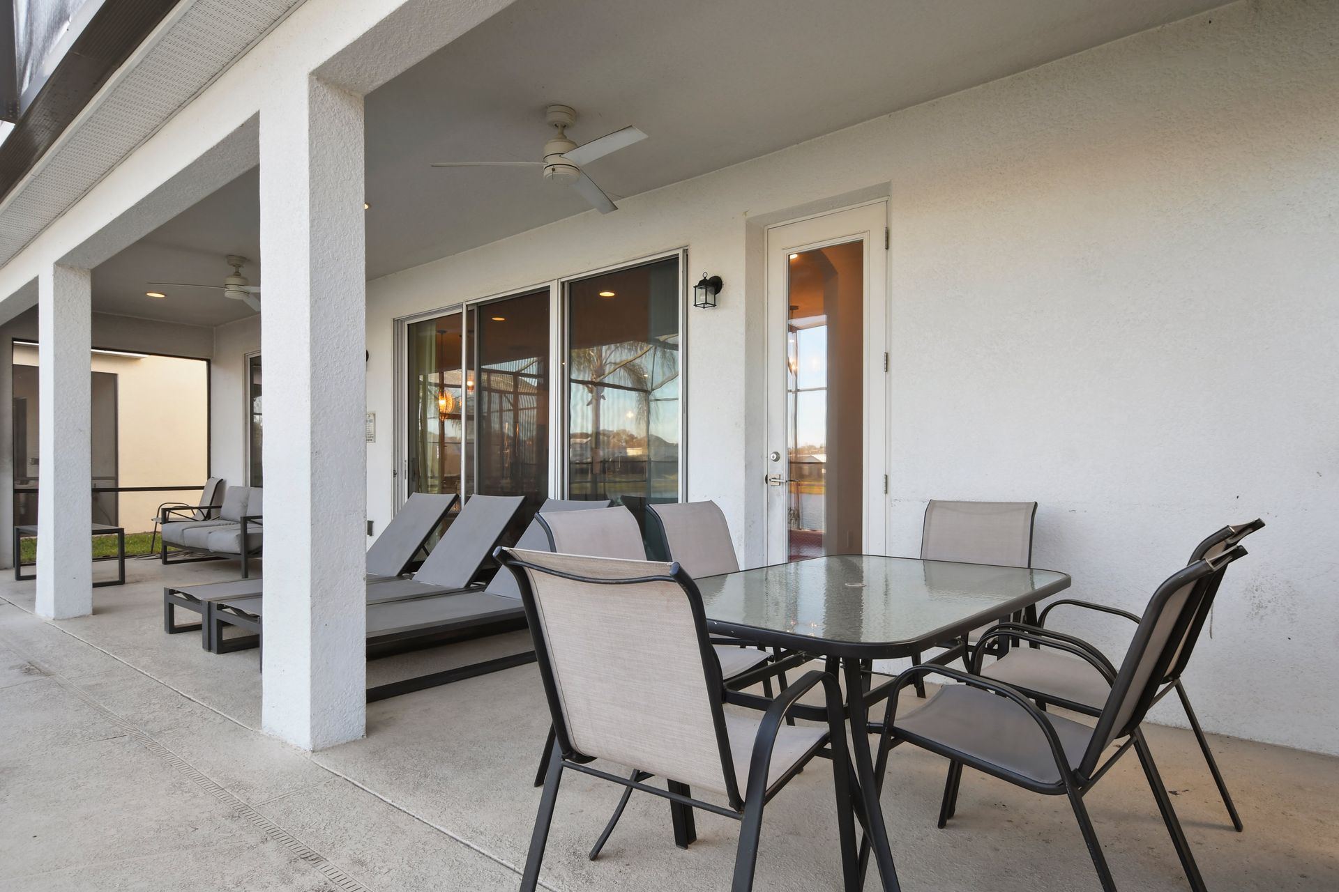 Outdoor dining and lounge area, perfect for poolside relaxing