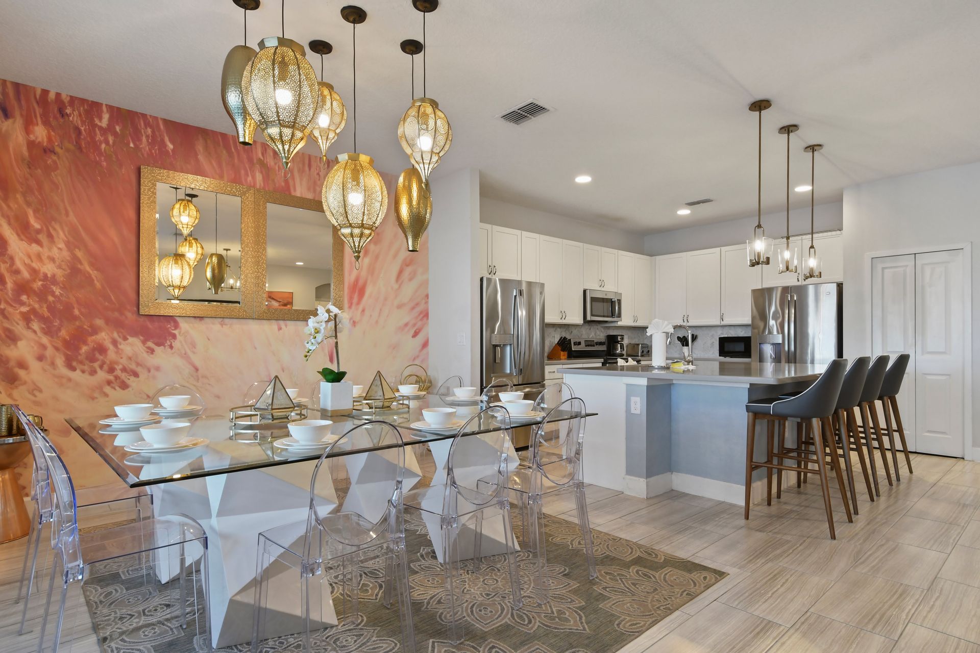 Stunning dining space with chic lighting, open kitchen, and style
