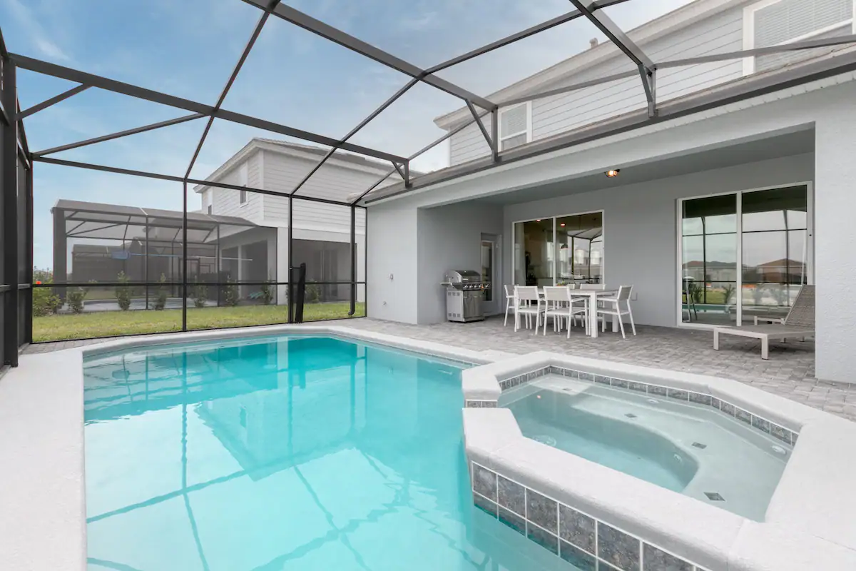 Chill in the private spa, take a swim, or grill poolside in screened comfort.