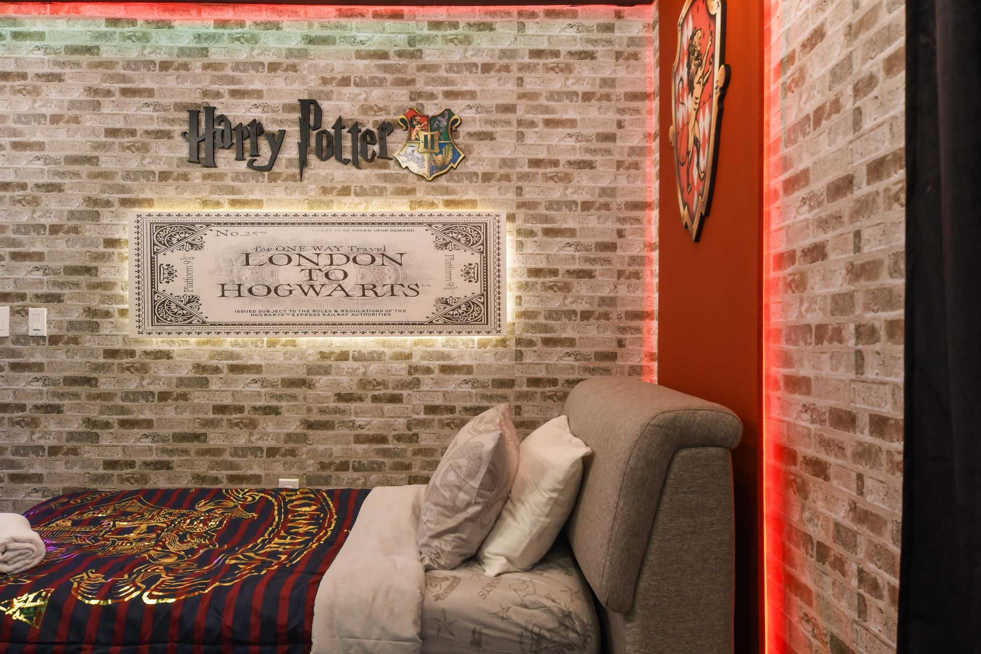 Wizard-themed room with Hogwarts Express ticket decor and Gryffindor charm!