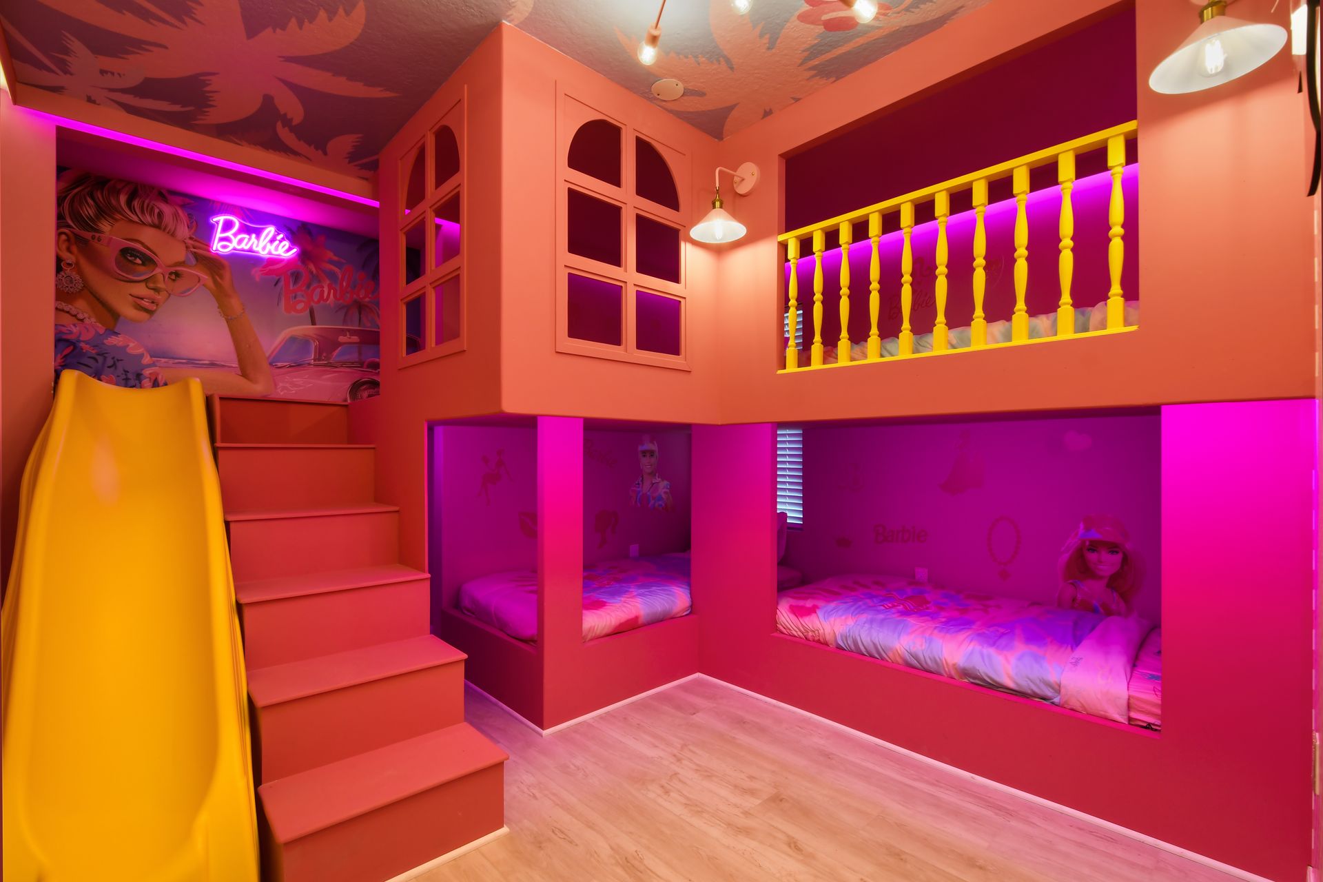 Barbie dream room with cozy bunk beds, slide, and vibrant pink vibes!