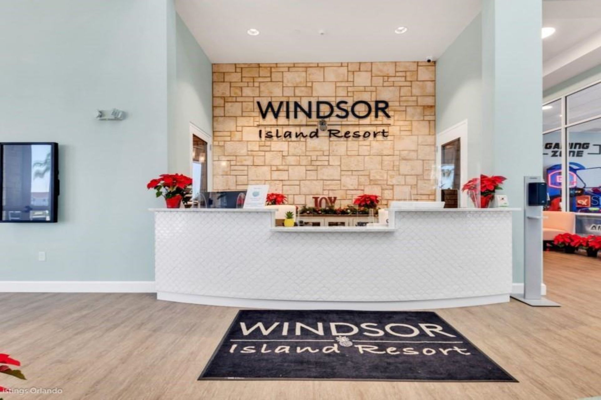 Welcoming lobby of Windsor Island Resort, featuring a stylish reception area and festive decor.