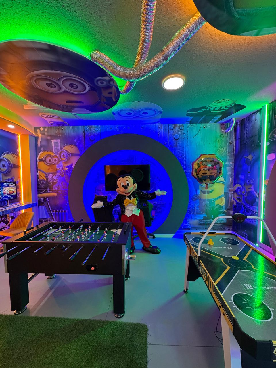 Themed game zone with foosball, air hockey & vibrant fun!