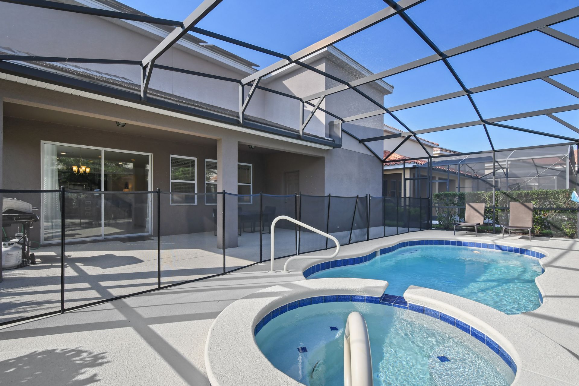 Relax by the private screened pool and spa in your own sunny backyard escape.