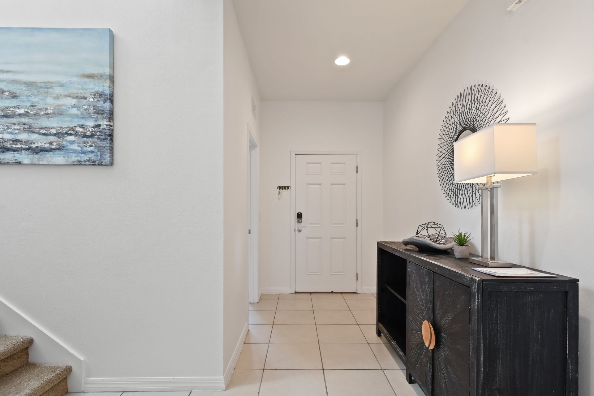 Stylish entryway with modern decor and a welcoming ambiance to start your stay.