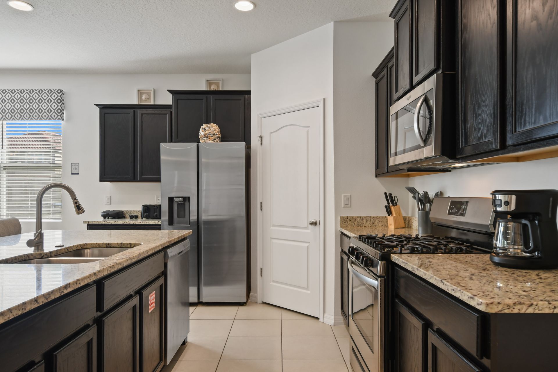 Unleash your inner chef in our modern kitchen, complete with top-of-the-line appliances for your convenience.
