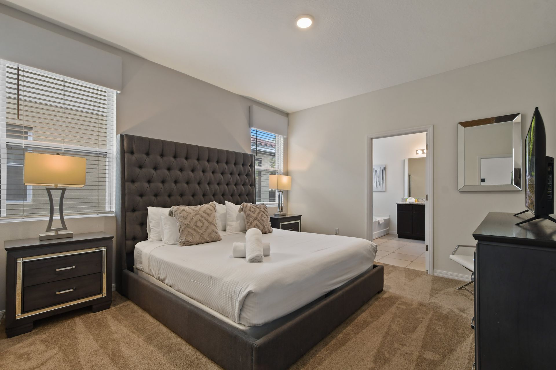 Spacious king suite with private bath, luxe decor, and natural light galore.