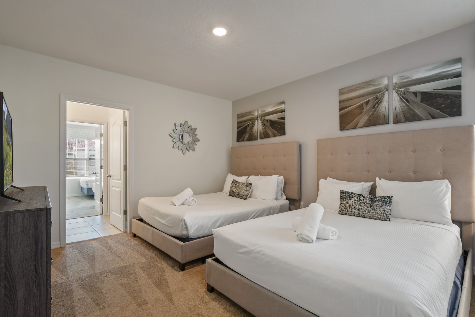 Spacious double full bedroom with stylish décor and direct ensuite access.