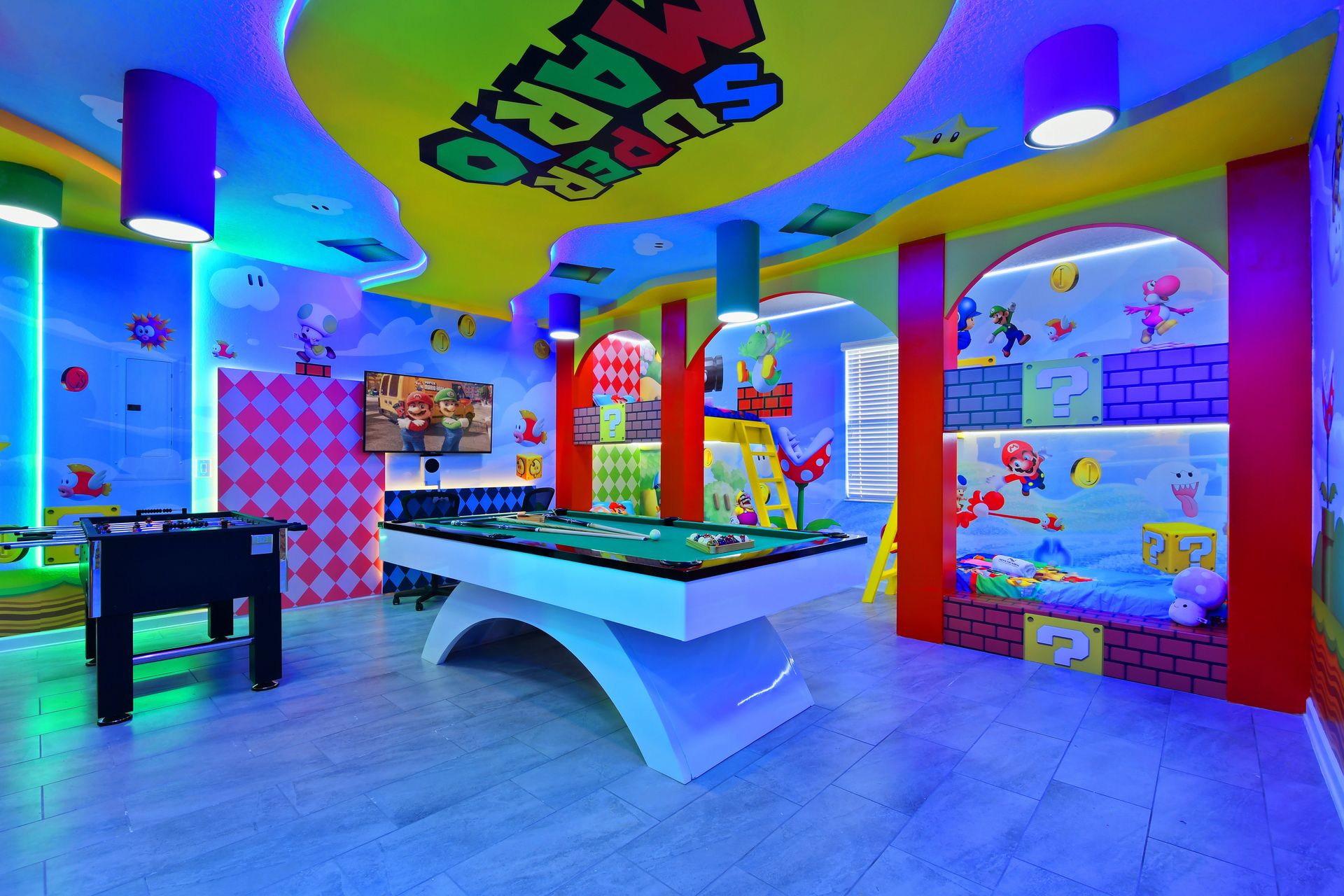 Jump into the ultimate Super Mario game room with arcades, pool, and bold colors!