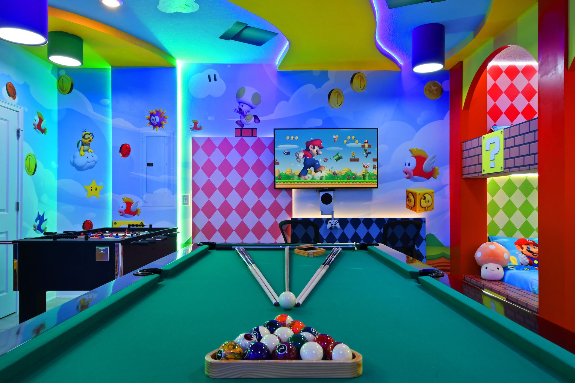 Jump into the ultimate Super Mario game room with arcades, pool, and bold colors!