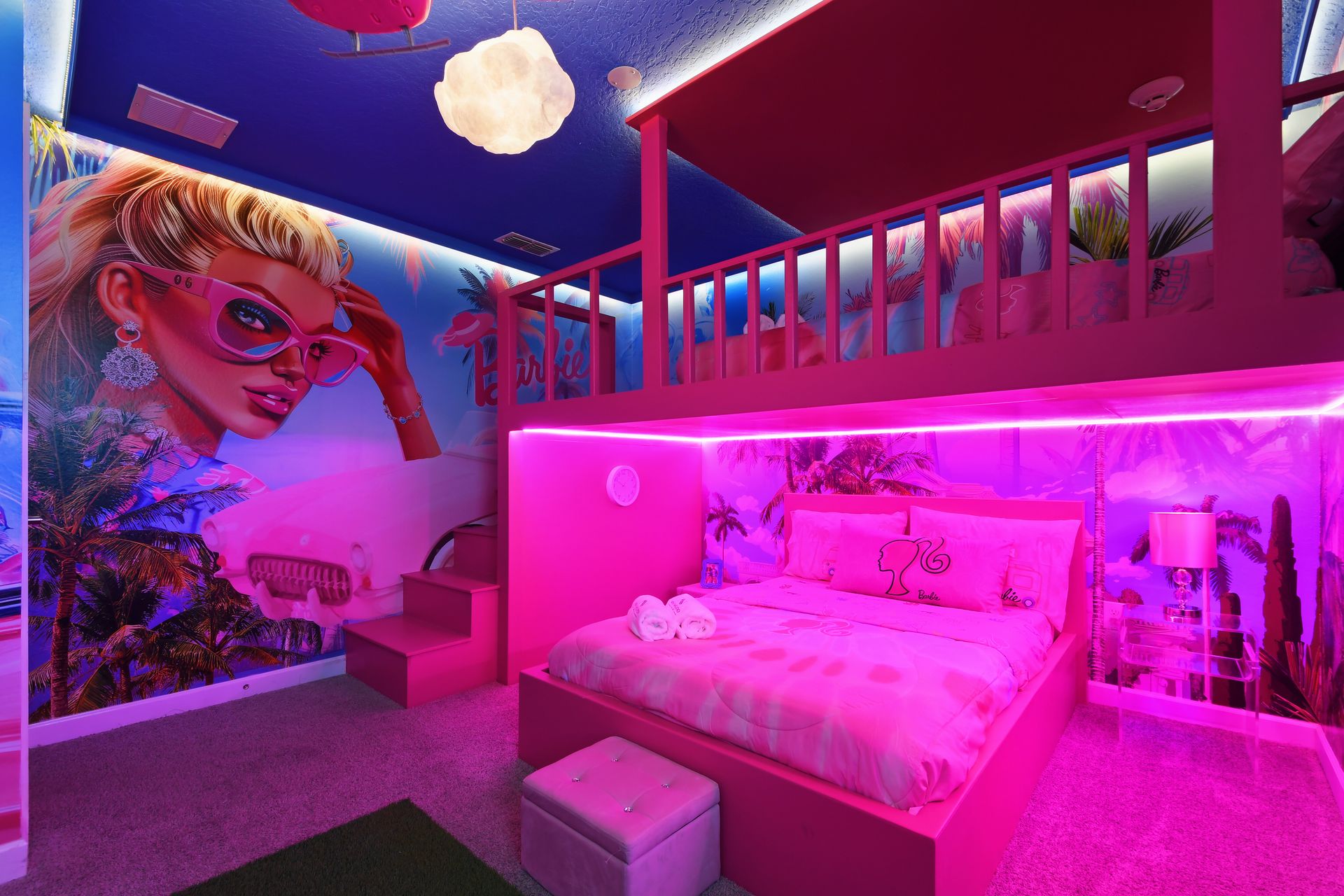 Step into a Barbie dream world in this vibrant pink loft room full of glam and fun!