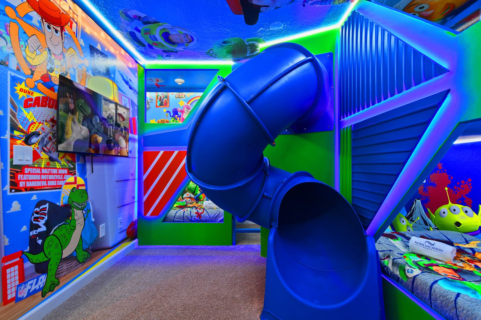 Slide into adventure in this Toy Story-themed room with bunk beds and bold colors!