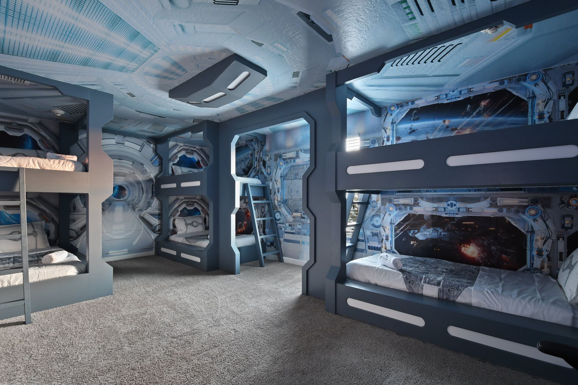 Blast off to dreamland in this space-themed bunk room built like a starship cabin!