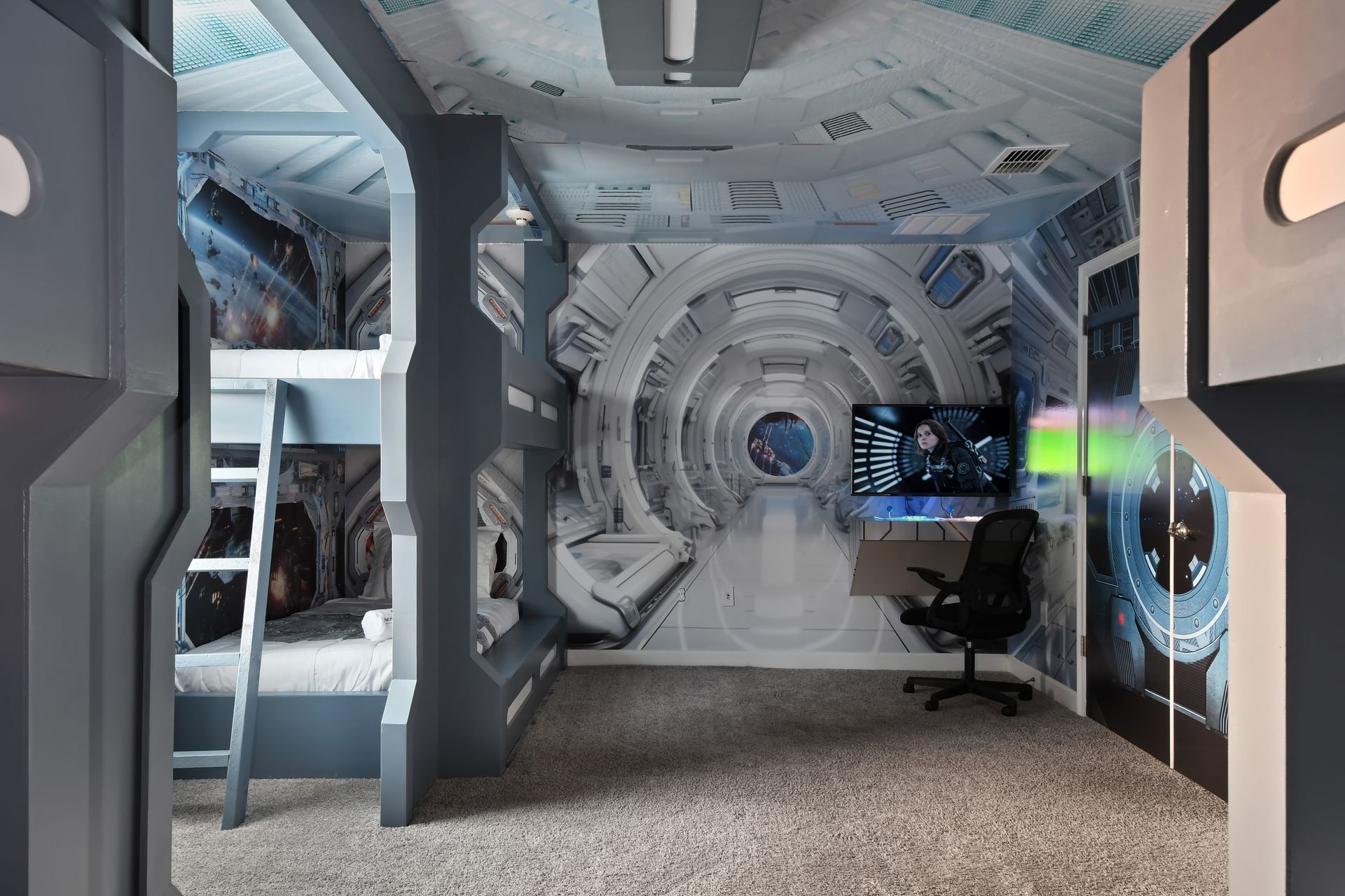 Blast off to dreamland in this space-themed bunk room built like a starship cabin!