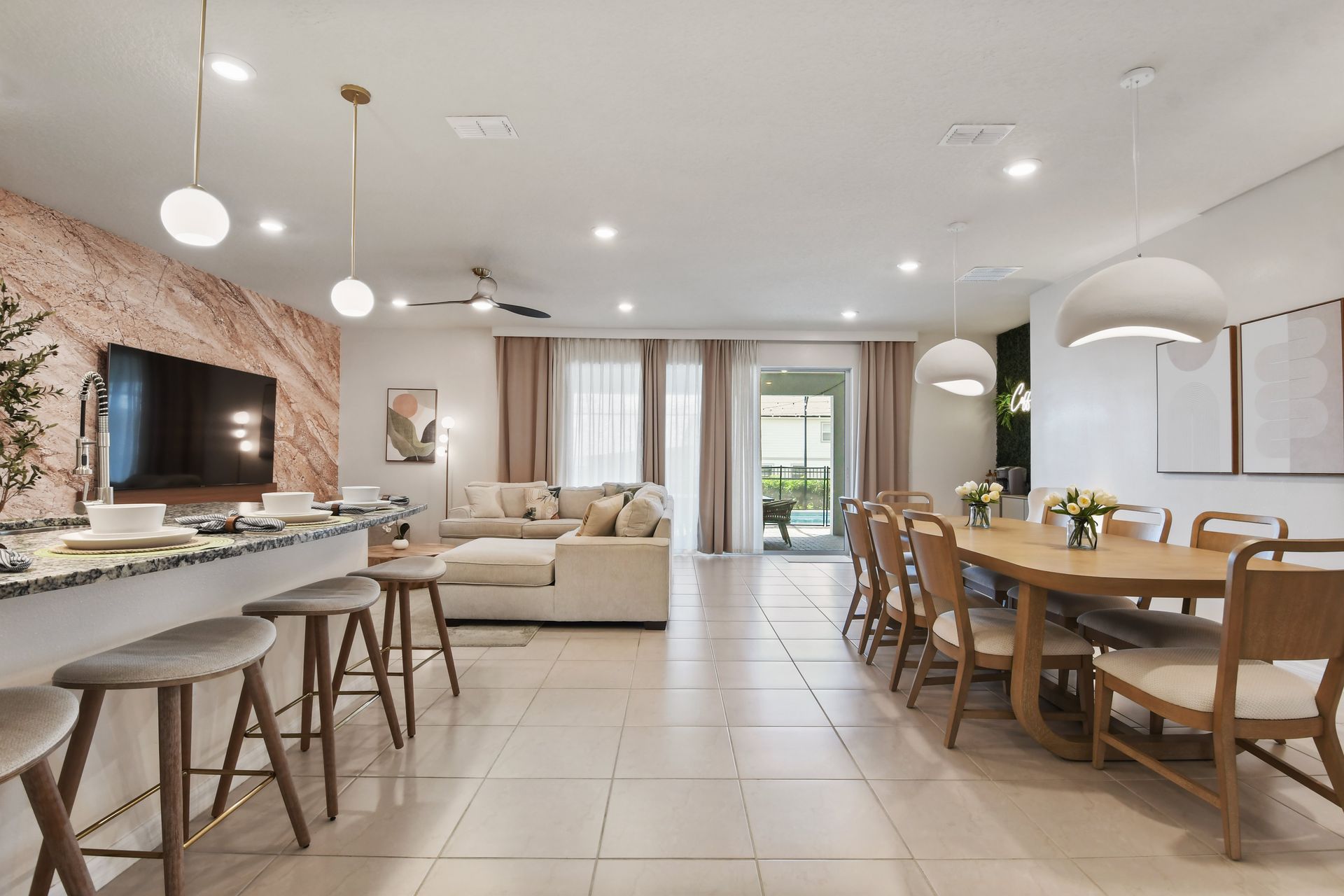 Spacious dining & kitchen area with modern elegance, perfect for family gatherings!