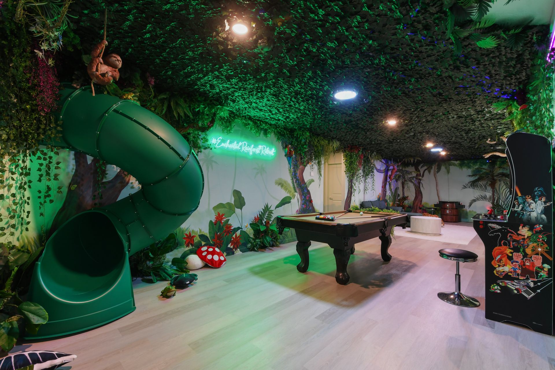 Step into an enchanted rainforest! Slide, arcade, and pool table for endless fun!